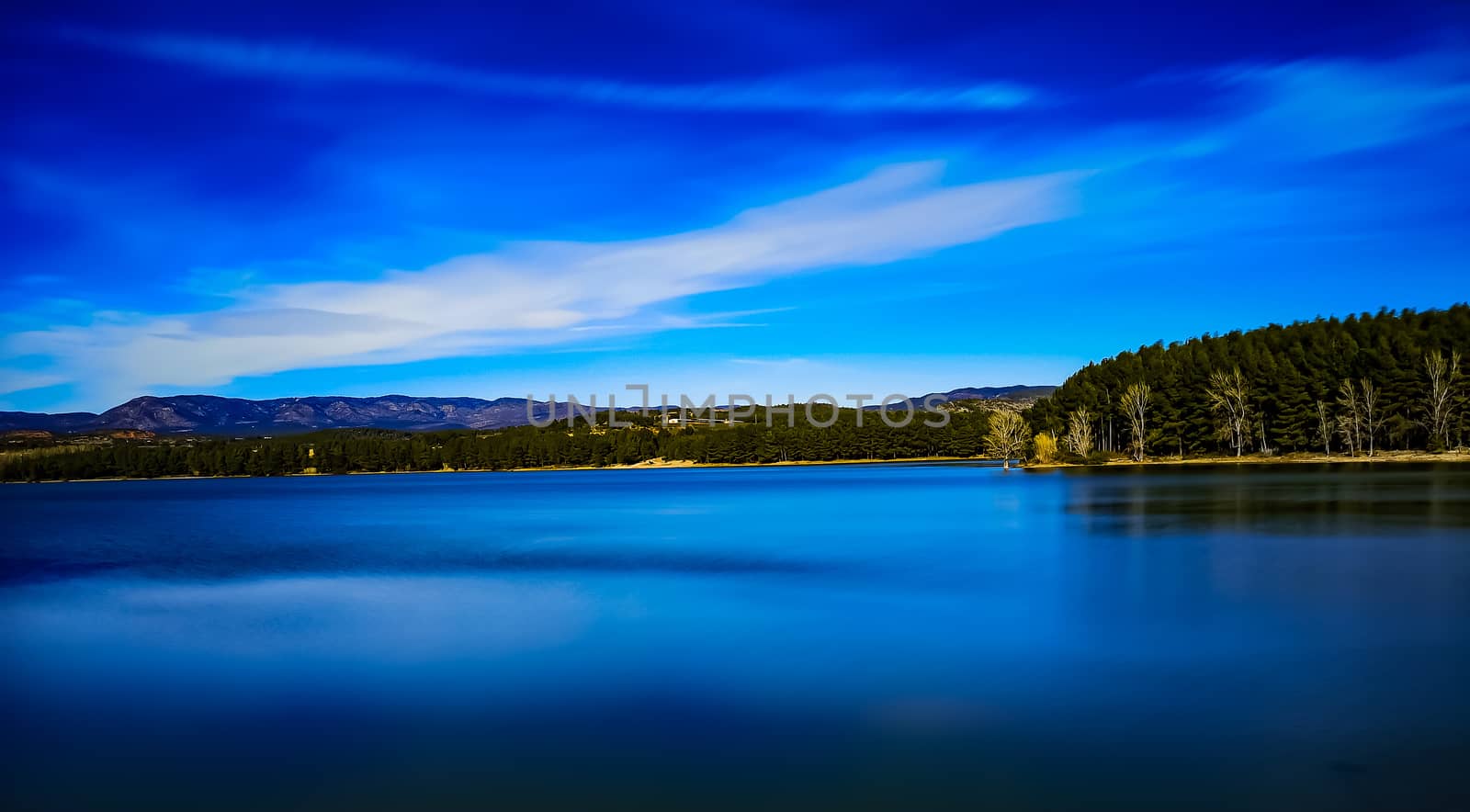 View of the Regajo reservoir with the mountains in the background