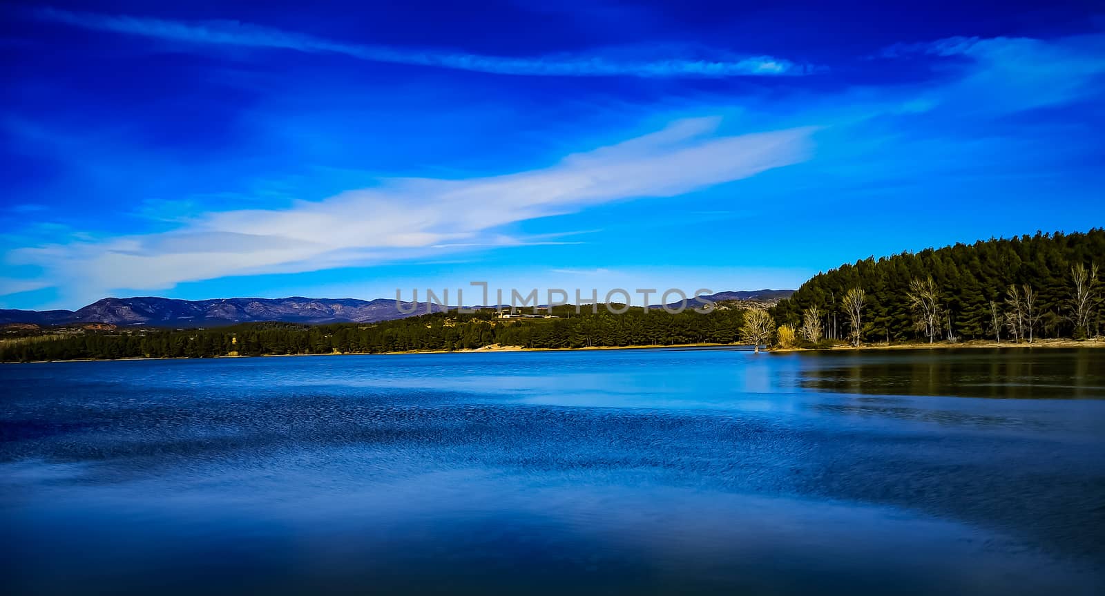 View of the Regajo reservoir with the mountains in the background