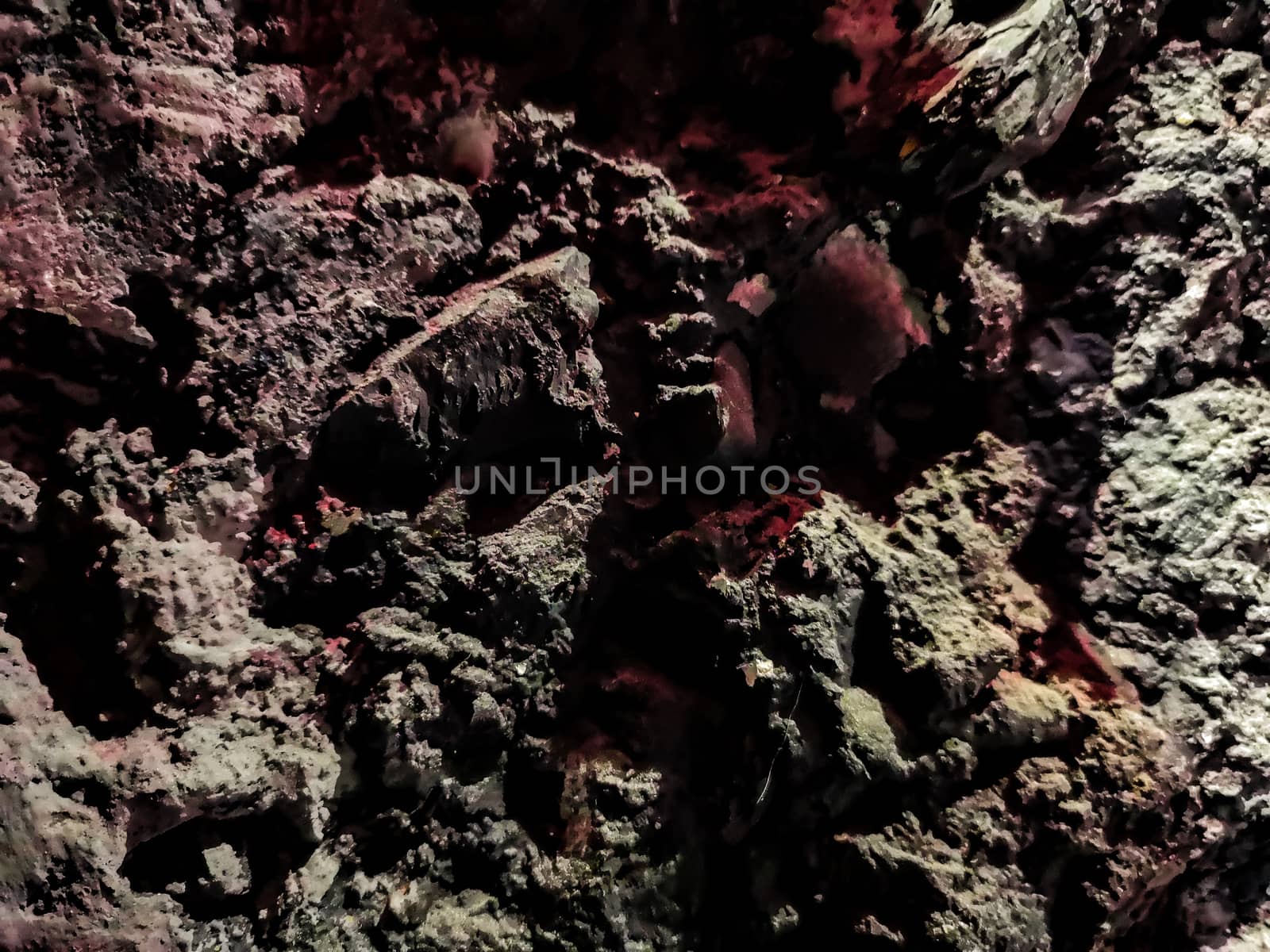 Natural rock background in brown and purple tones