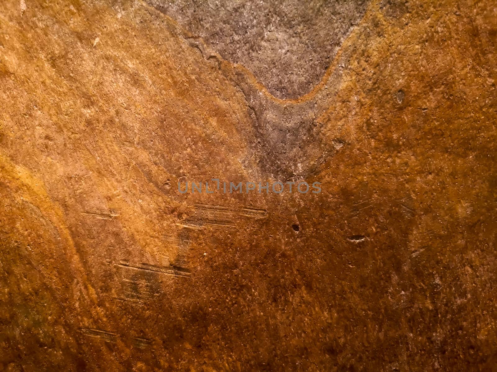 Natural rock background in brown and purple tones