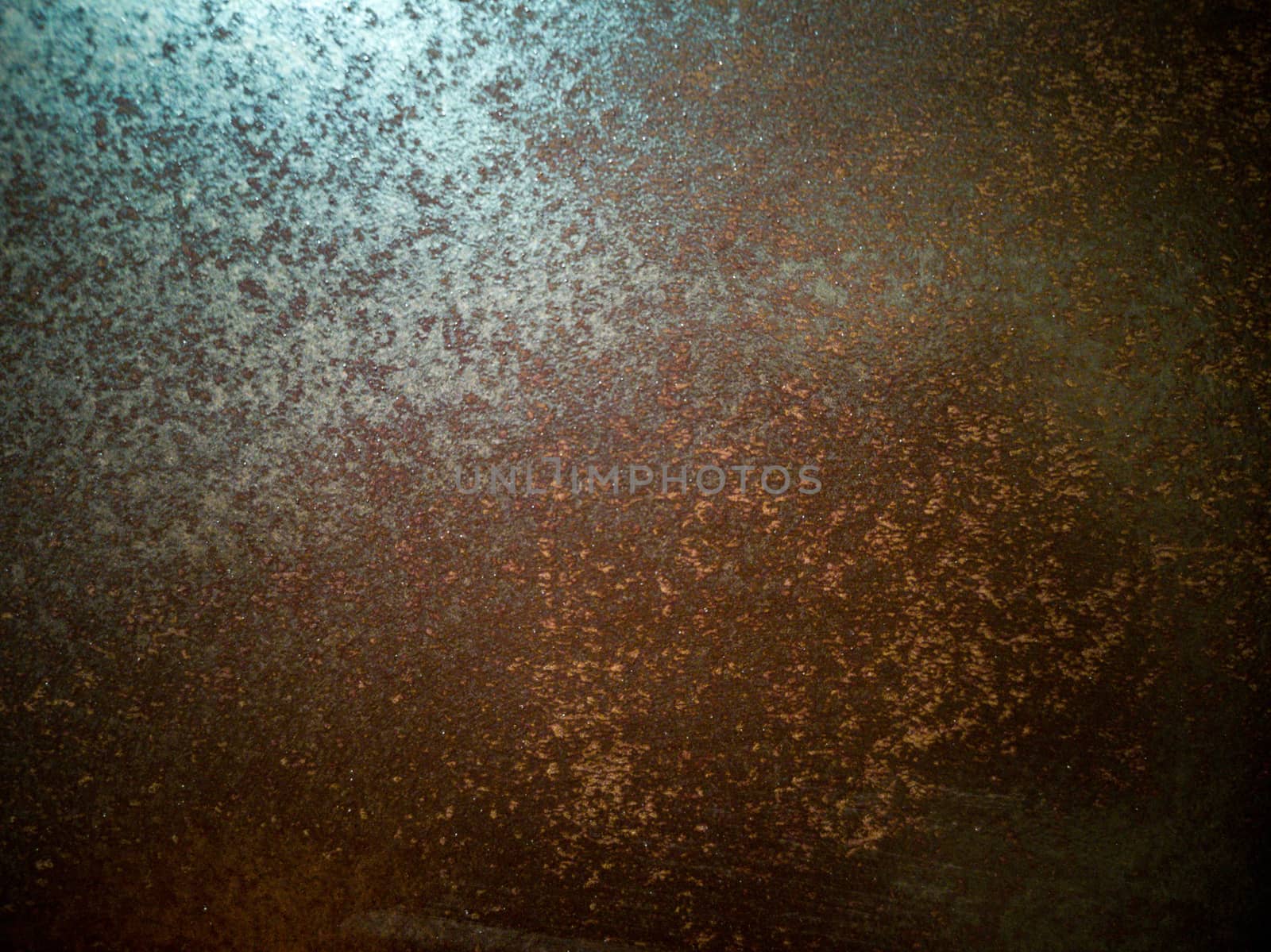 Rusty metal background with rough texture in brown tones