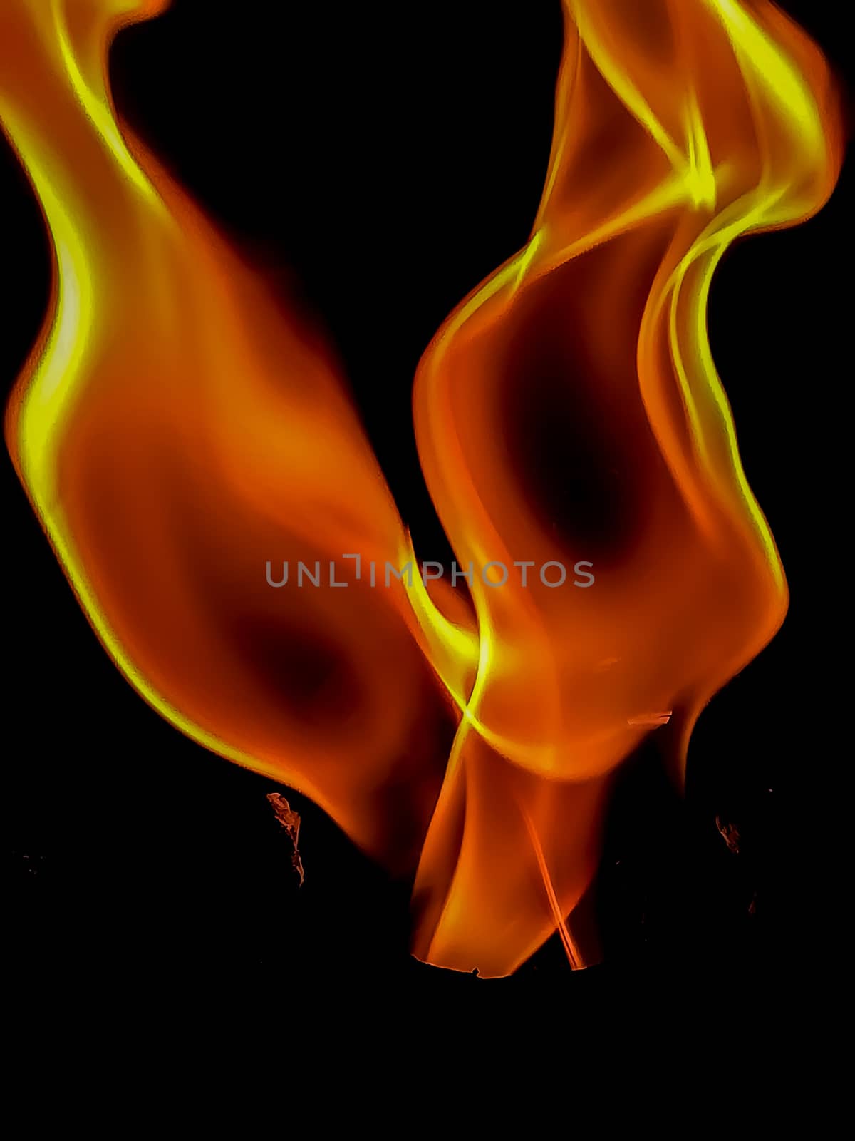 Fire in orange and yellow tones with peculiar shapes with black background