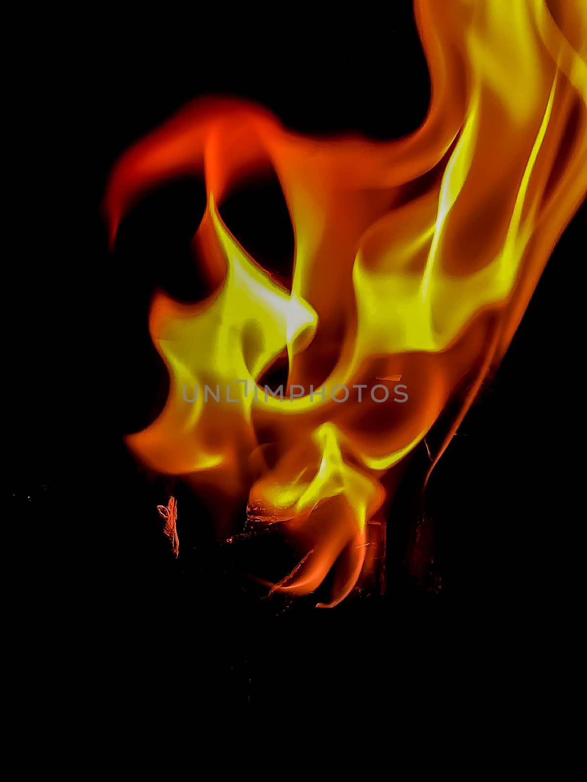 Fire in orange and yellow tones with peculiar shapes with black background