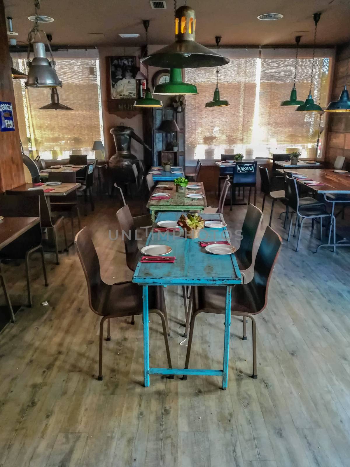 Curious interior decorated with worn and old antiques