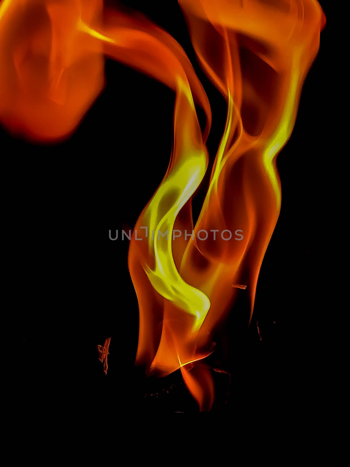 Fire in orange and yellow tones with peculiar shapes with black background