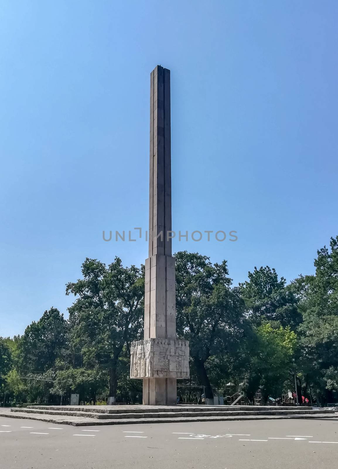 Tall stone tower in the Crang park in Romania