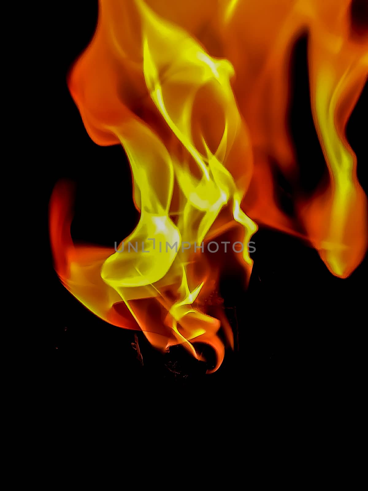 Fire in orange and yellow tones with peculiar shapes with black background