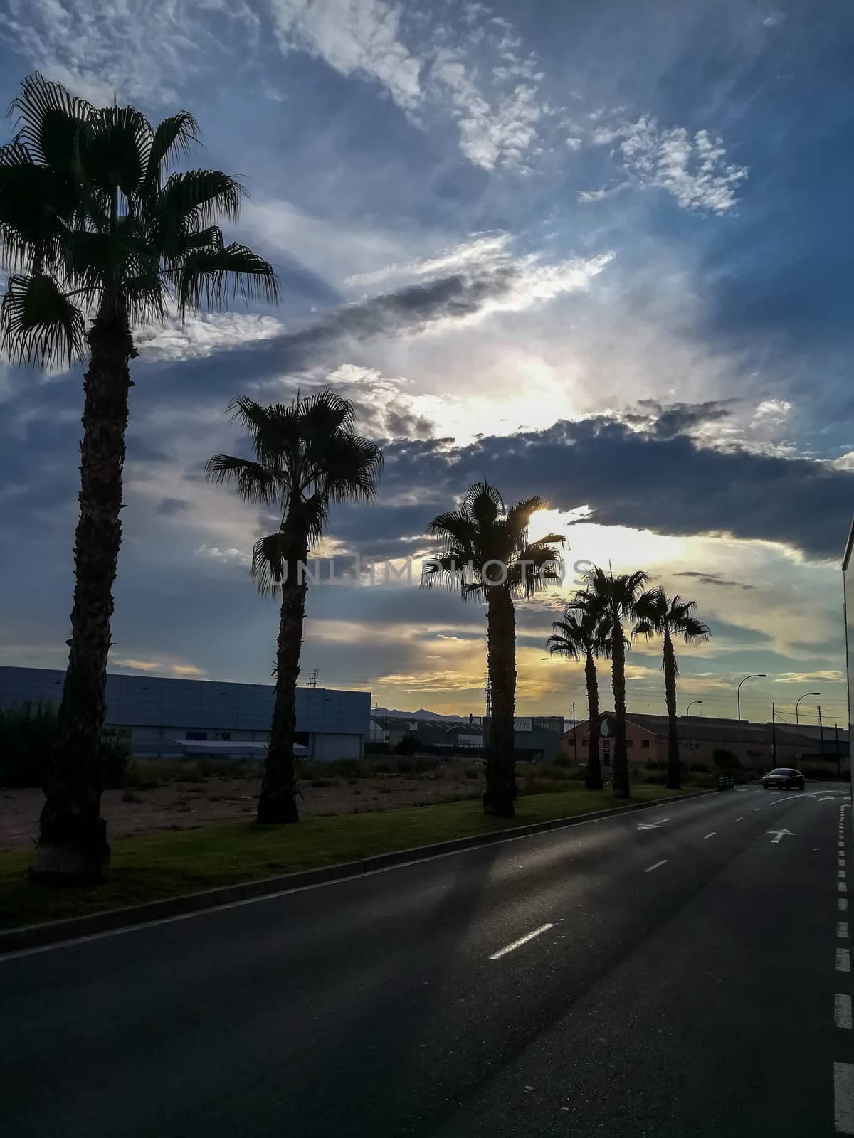 Sunset with threatening storm clouds over mountains