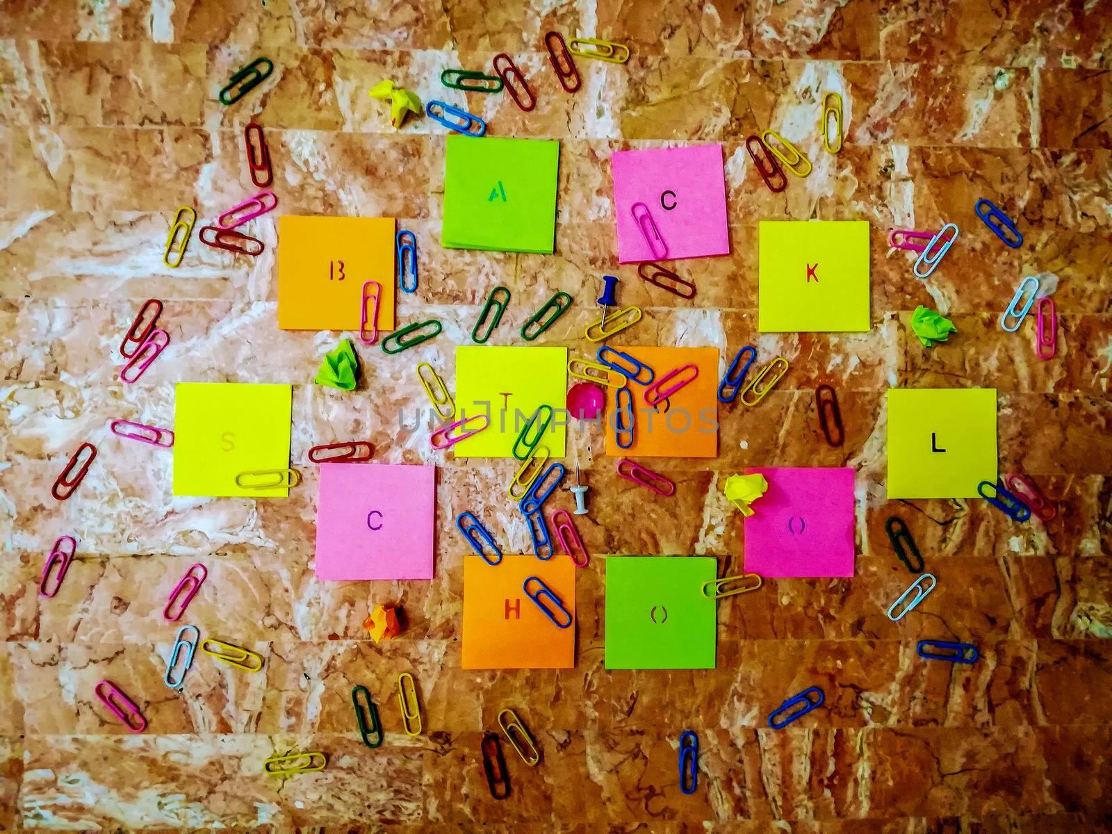 Various school material in composition on brown background