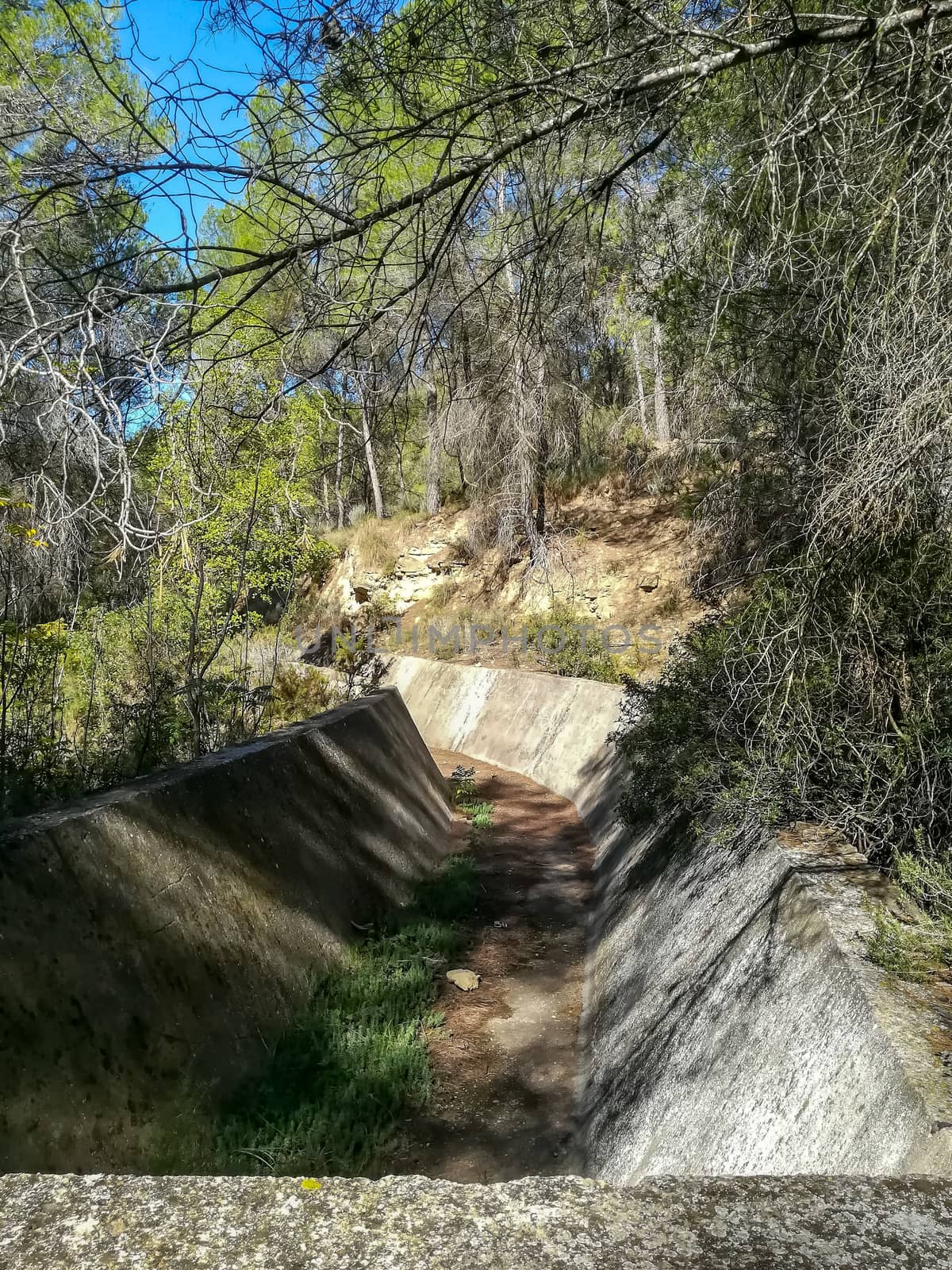 Old irrigation canal lost in a mountain of Navajas