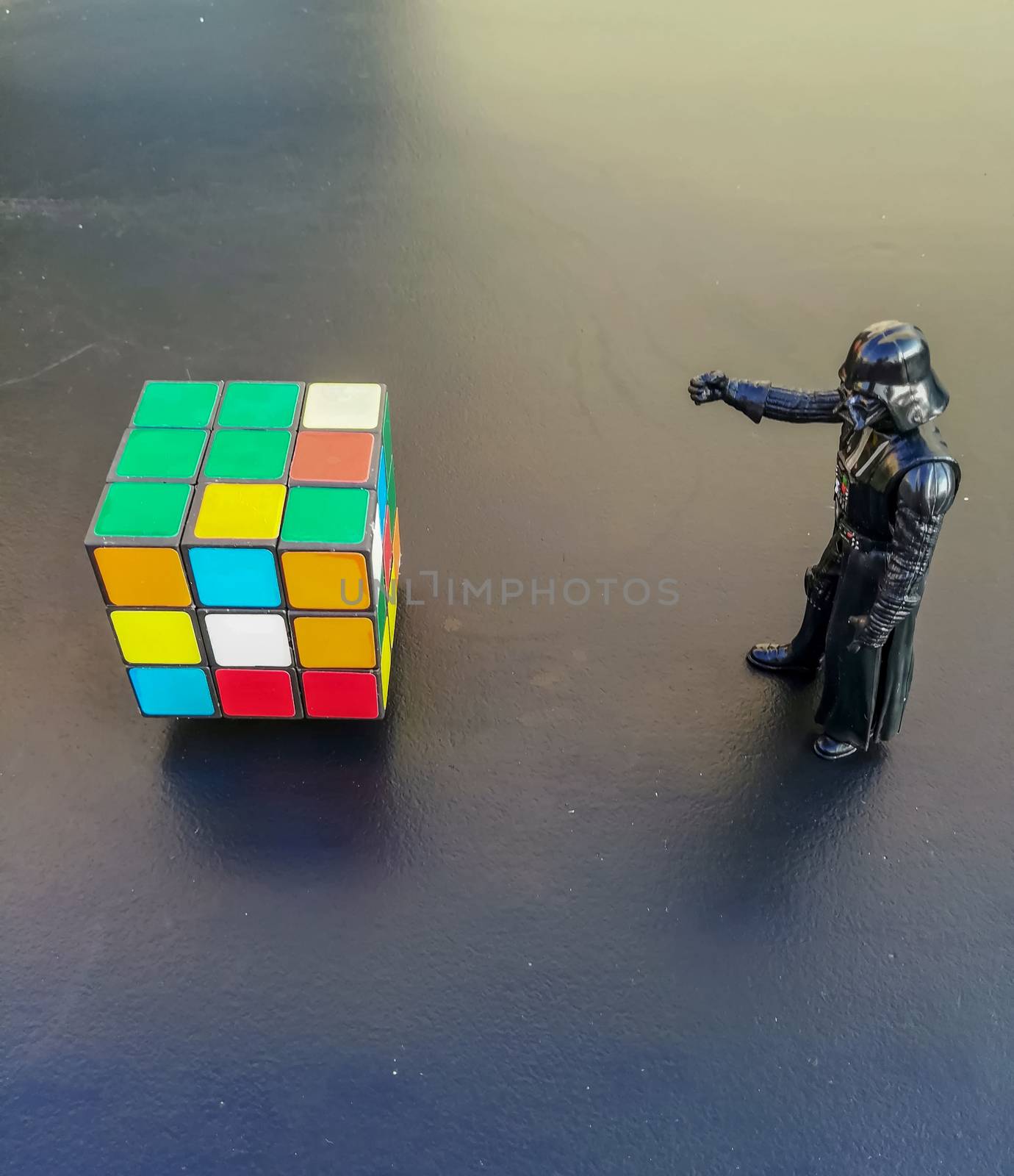 Burriana, Spain 08/09/18: Darth Vader doll using the force to solve a rubik cube