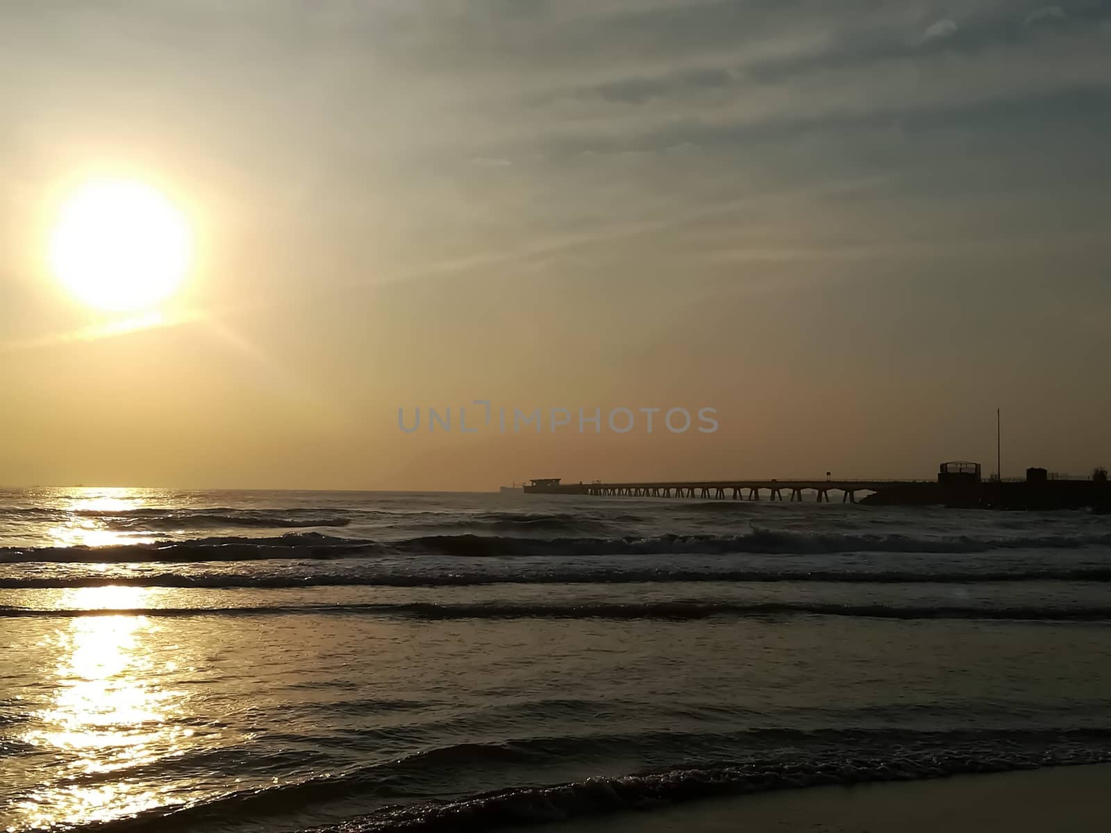 Beach of fine brown sand bathed by the waters of the Mediterranean Sea