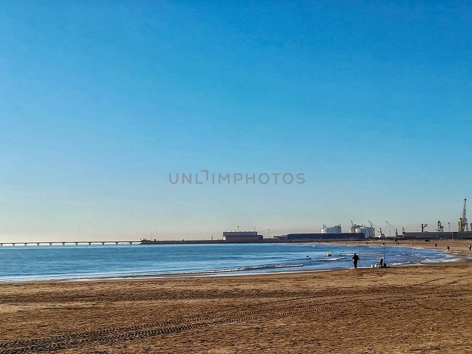 Beach of fine brown sand bathed by the waters of the Mediterranean Sea