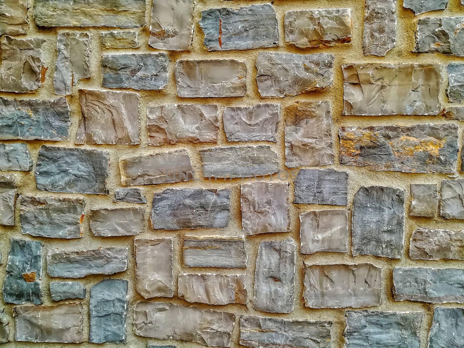 Facade view of stones in pastel colors