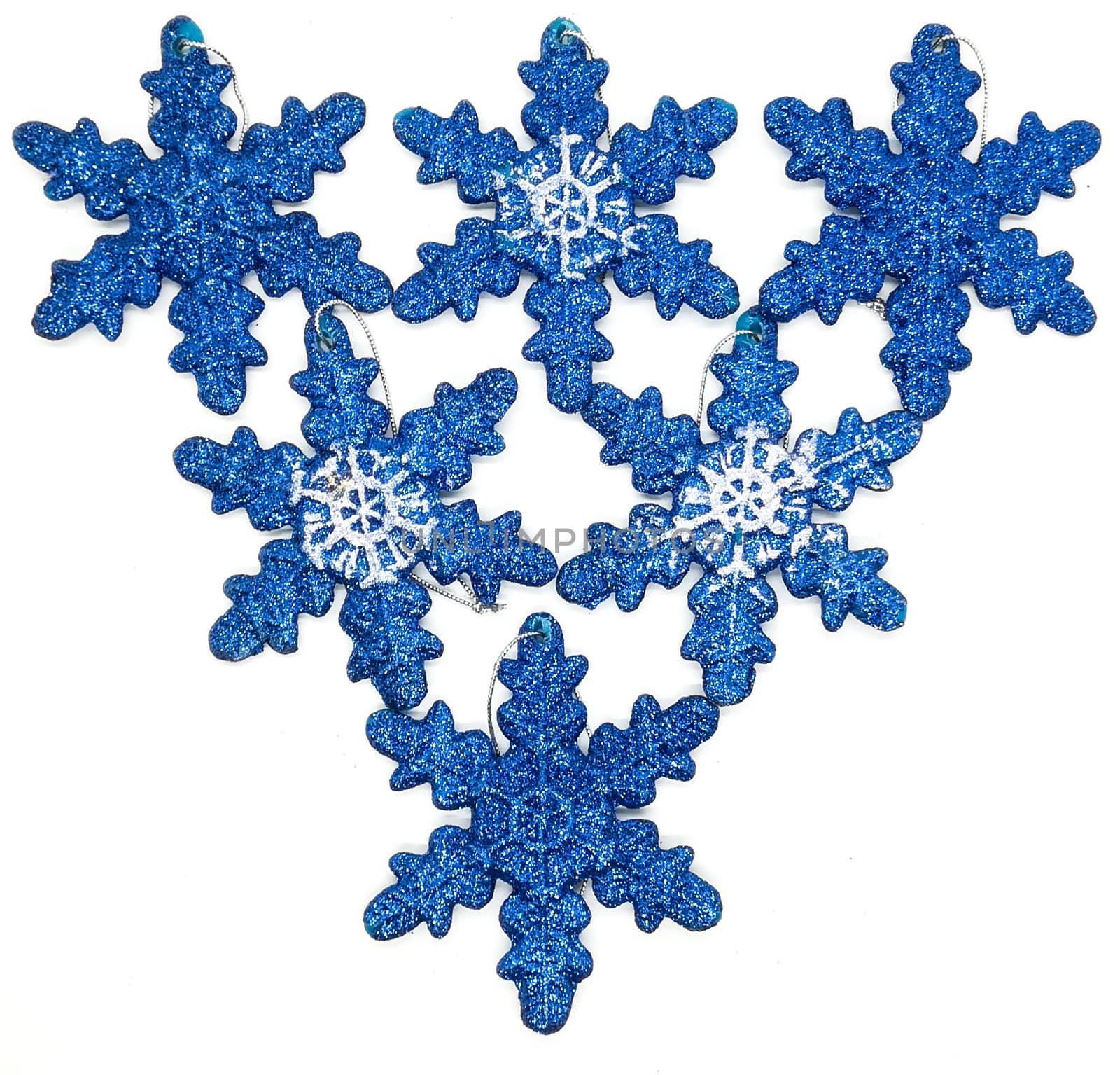 Blue christmas decorations in composition on white background