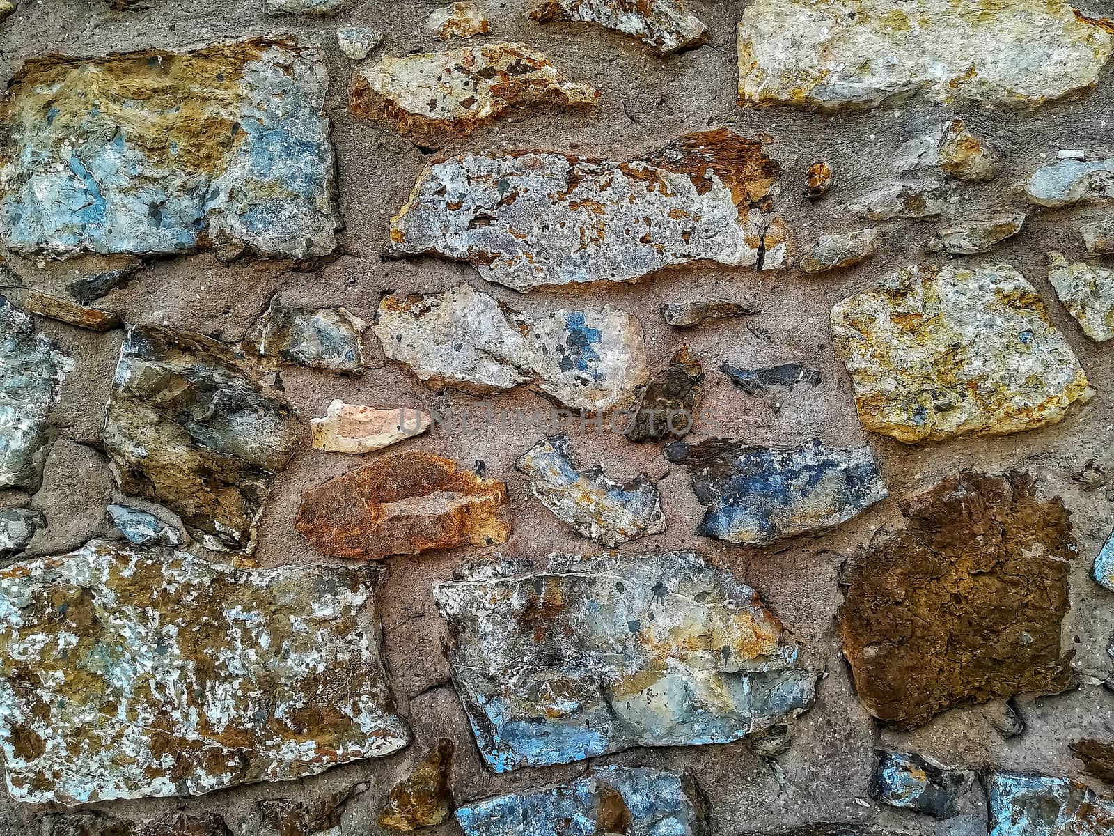 Facade view of stones in pastel colors