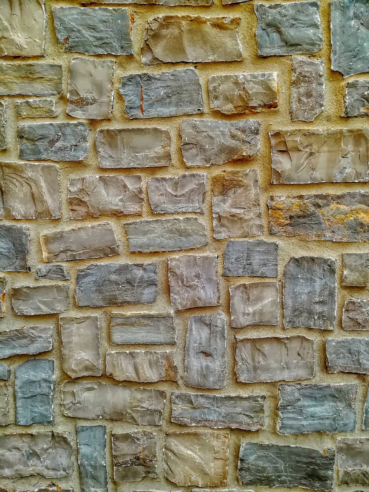 Facade view of stones in pastel colors