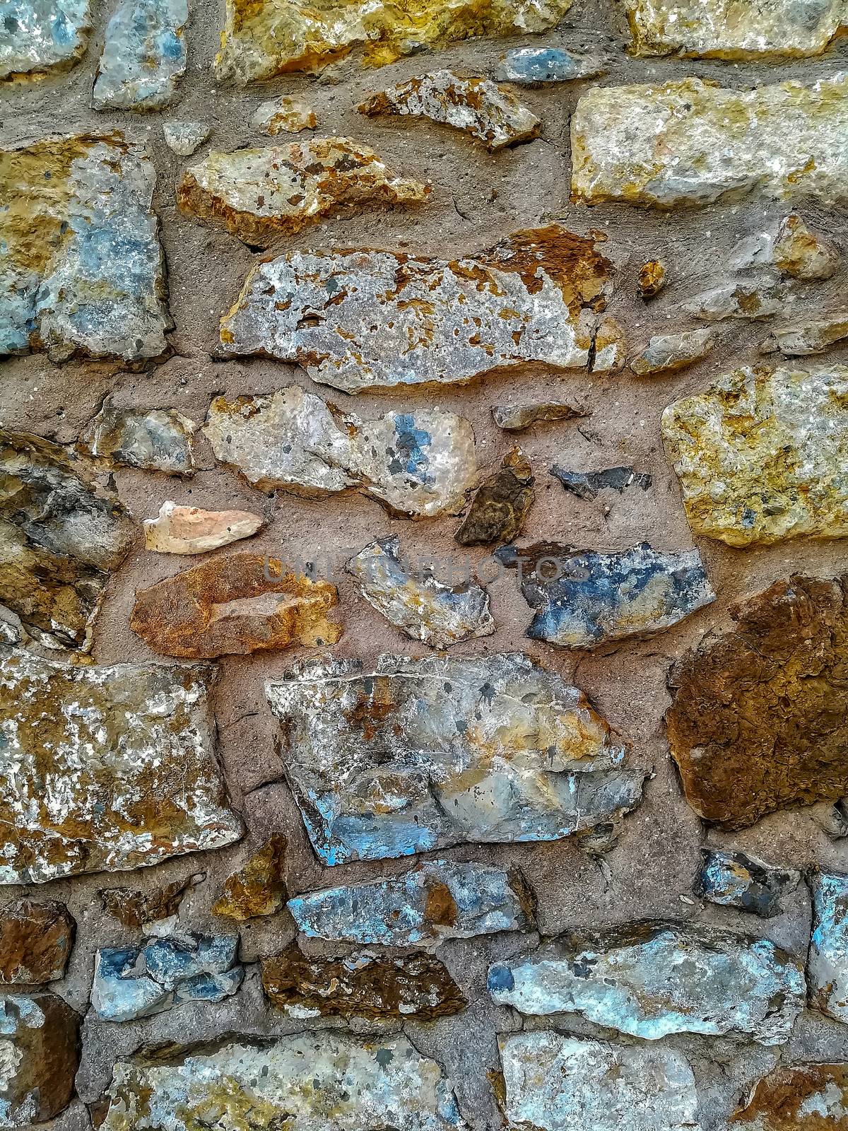 Facade view of stones in pastel colors