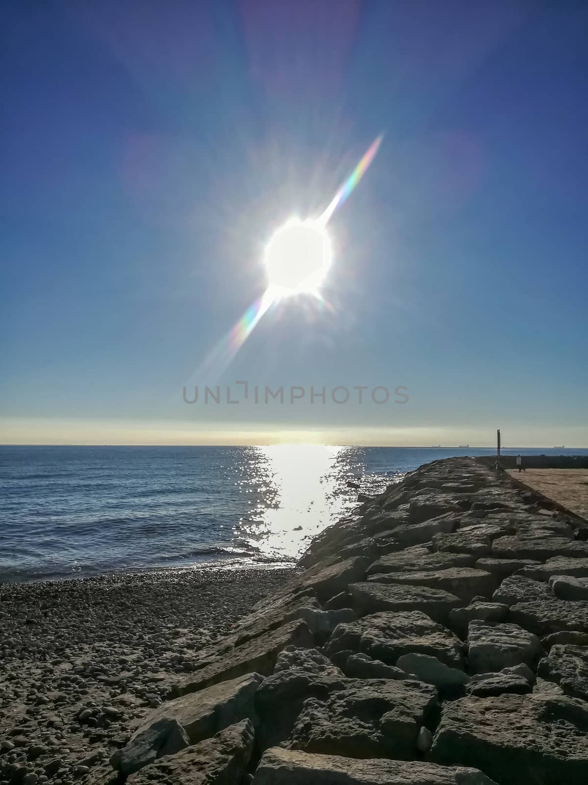 Beach of fine brown sand bathed by the waters of the Mediterranean Sea