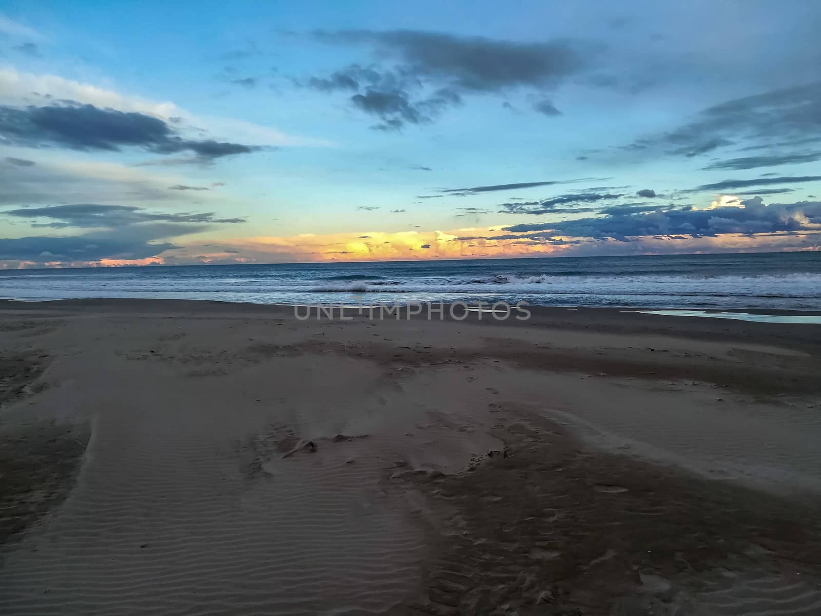 Beach of fine brown sand bathed by the waters of the Mediterranean Sea