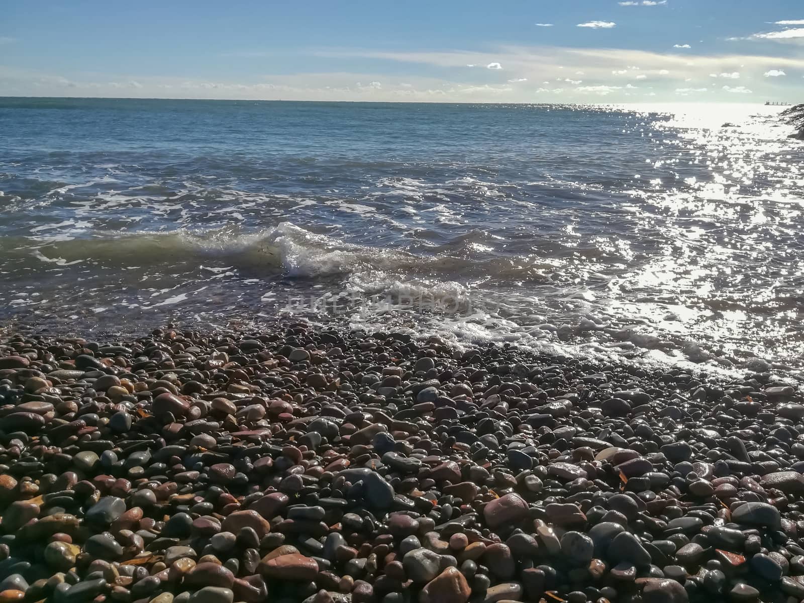 Small stone beach bathed by the waters of the Mediterranean Sea