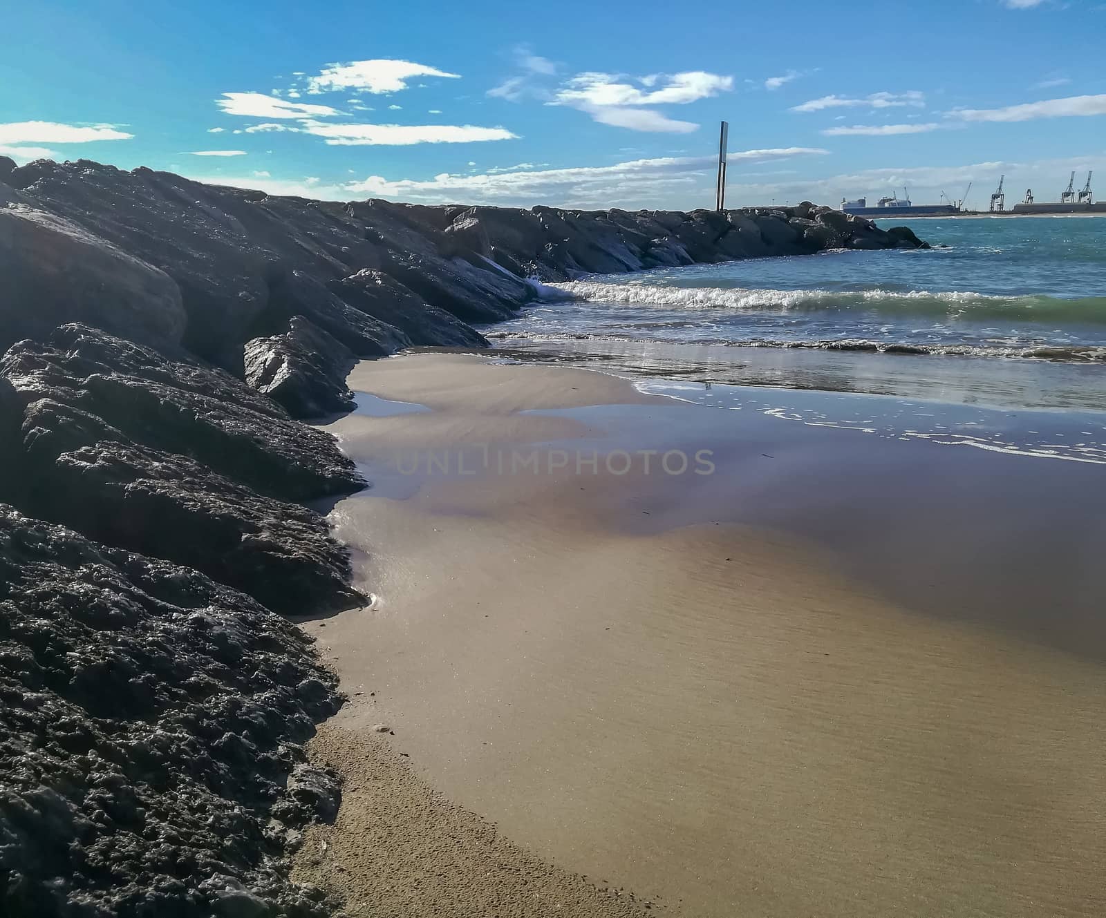 Breakwater on the beach in the Port of Sagunto