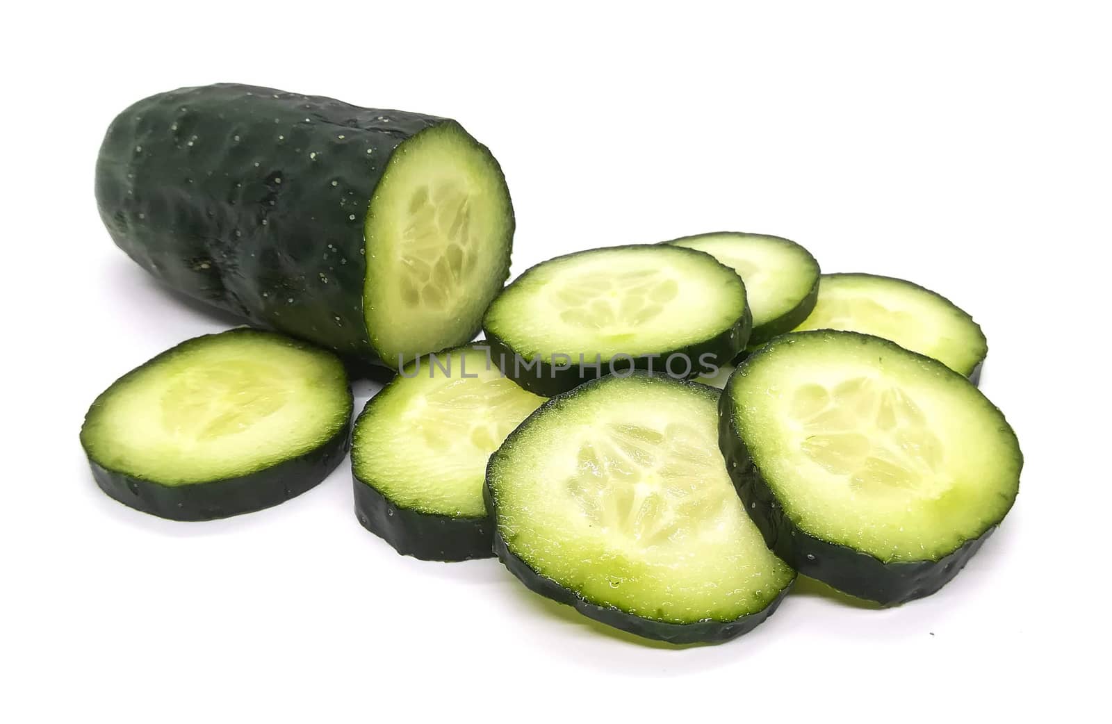 Sliced vegetables in composition on white background