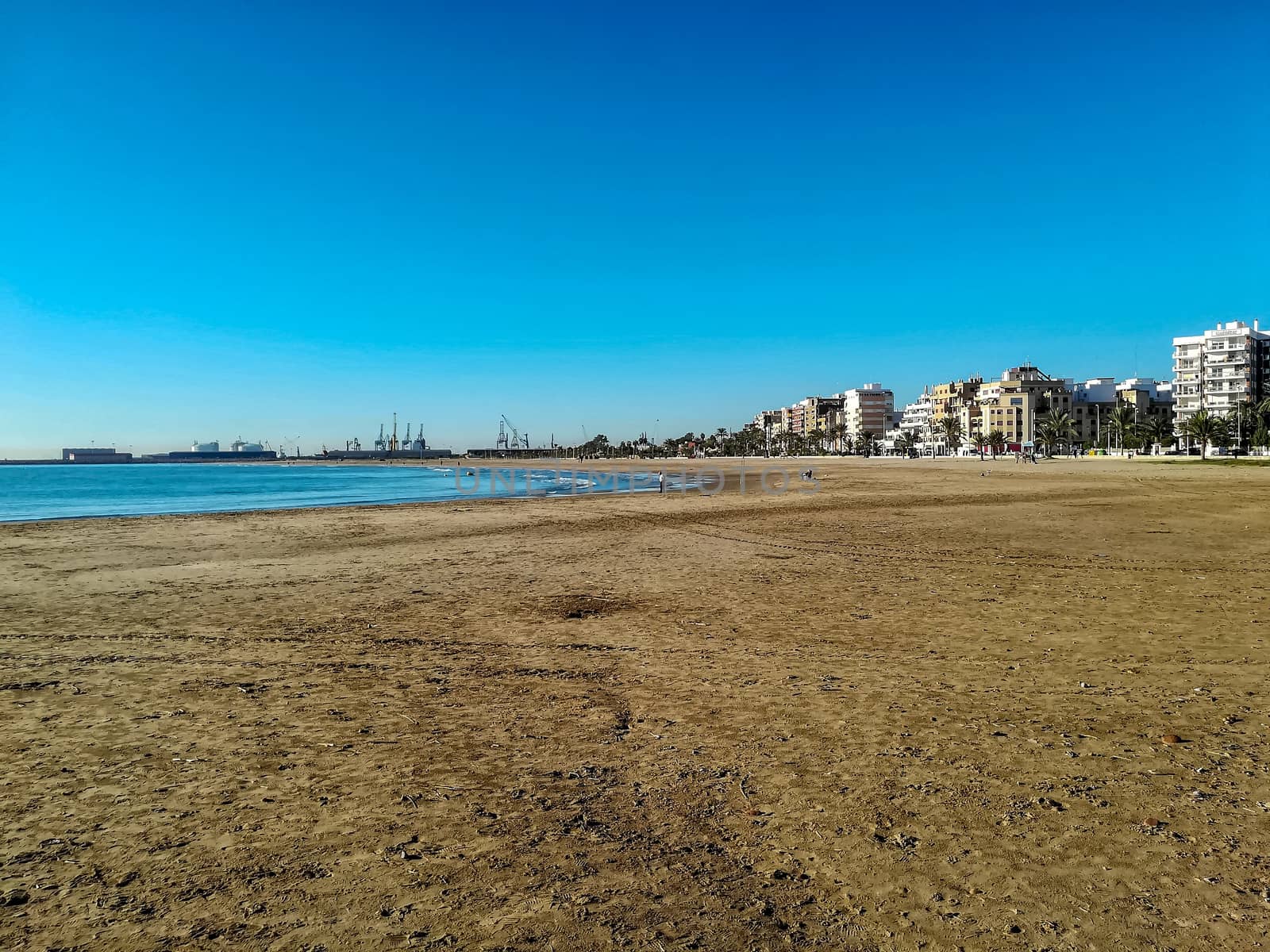 Beach of fine brown sand bathed by the waters of the Mediterranean Sea