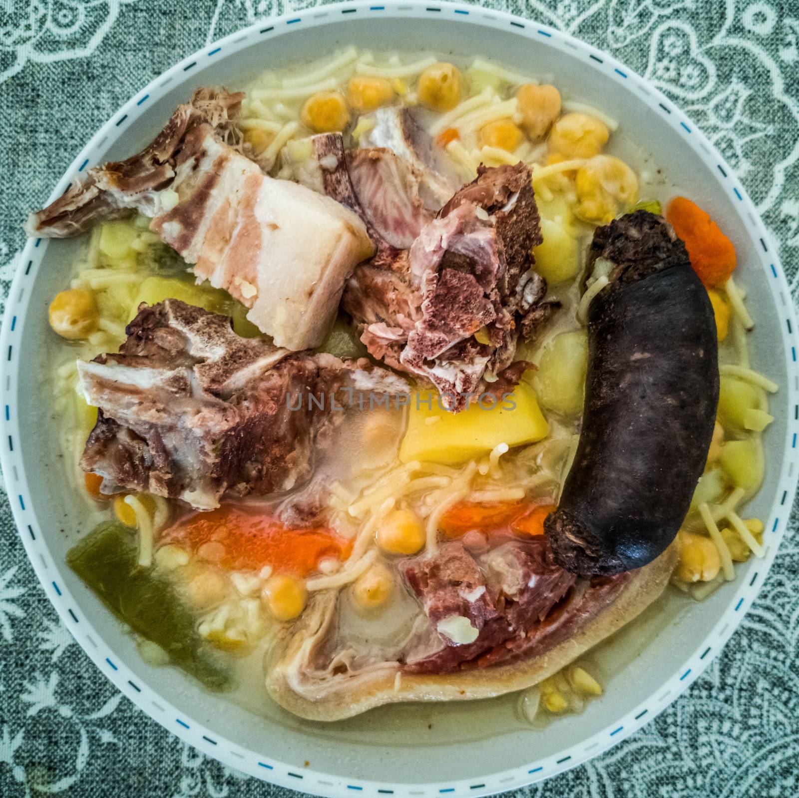 View of typical spanish food with meat and blood sausage
