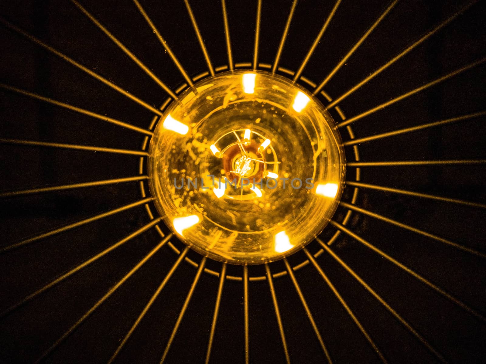 View from below of a bulb on a black background