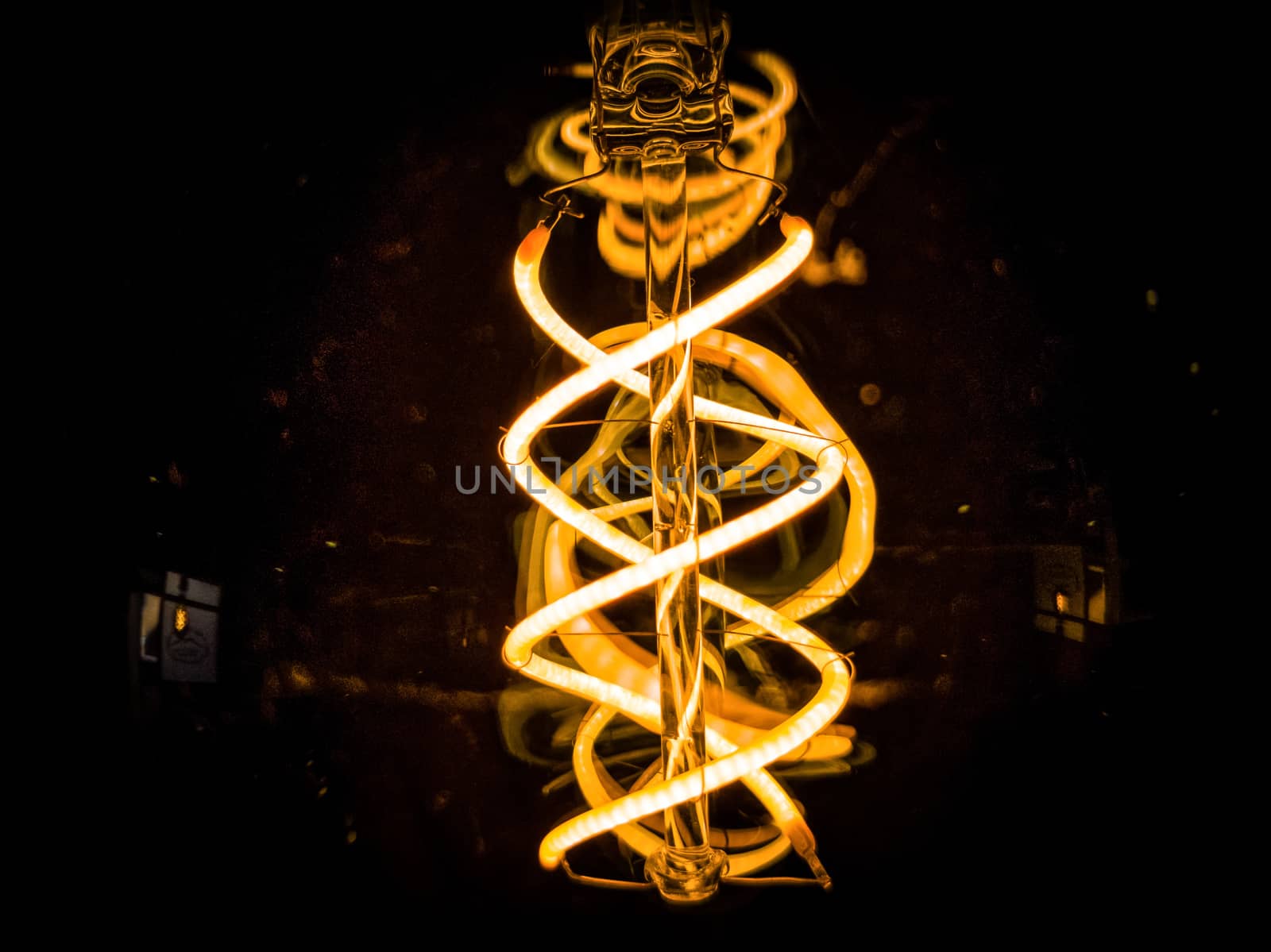 View from below of a bulb on a black background