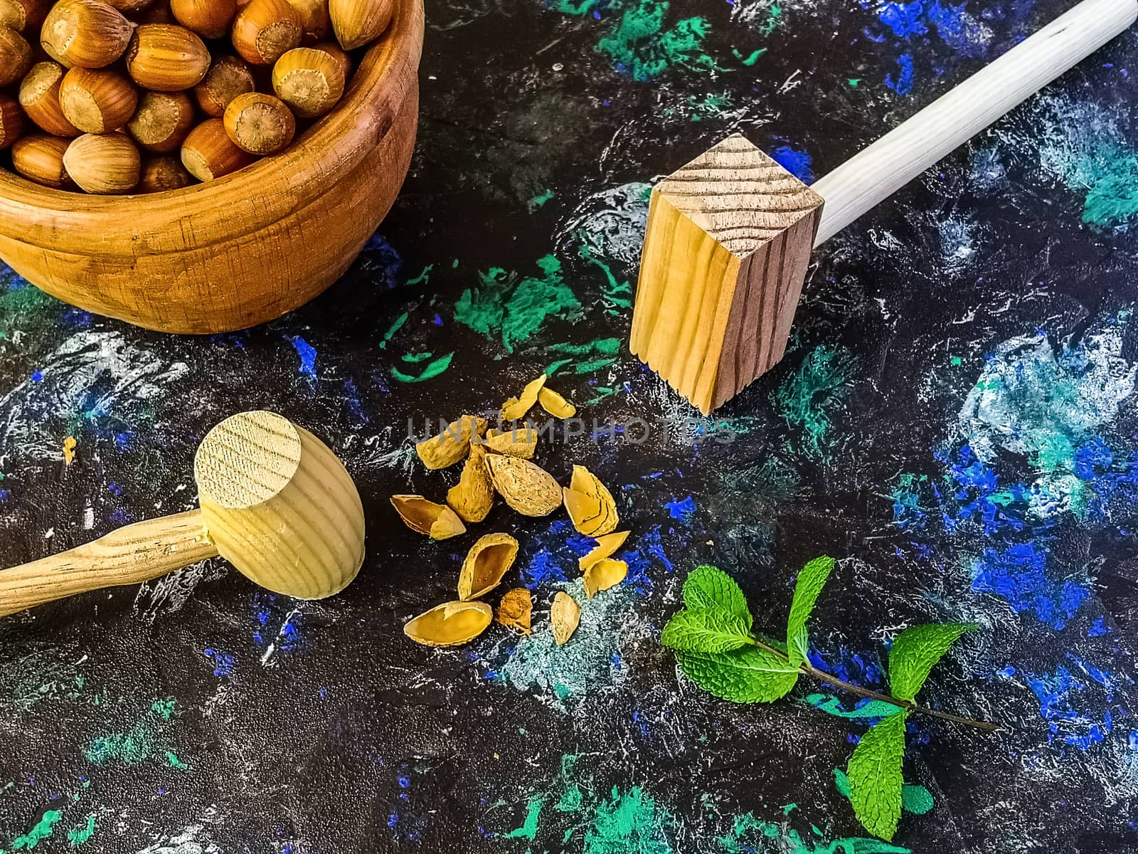 Walnuts and hazelnuts in composition on dark background by Barriolo82