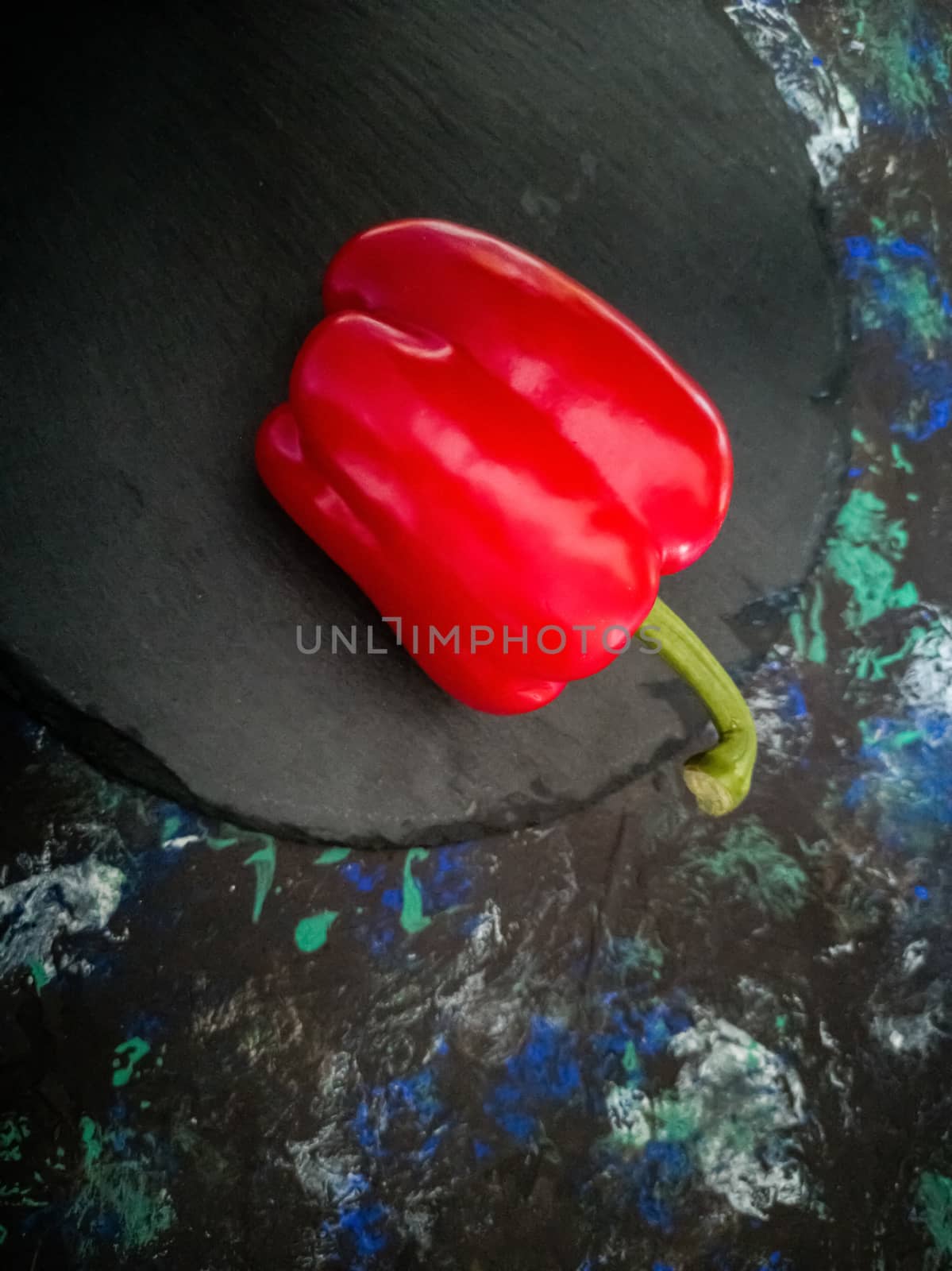Orchard vegetables in composition on dark and rough background