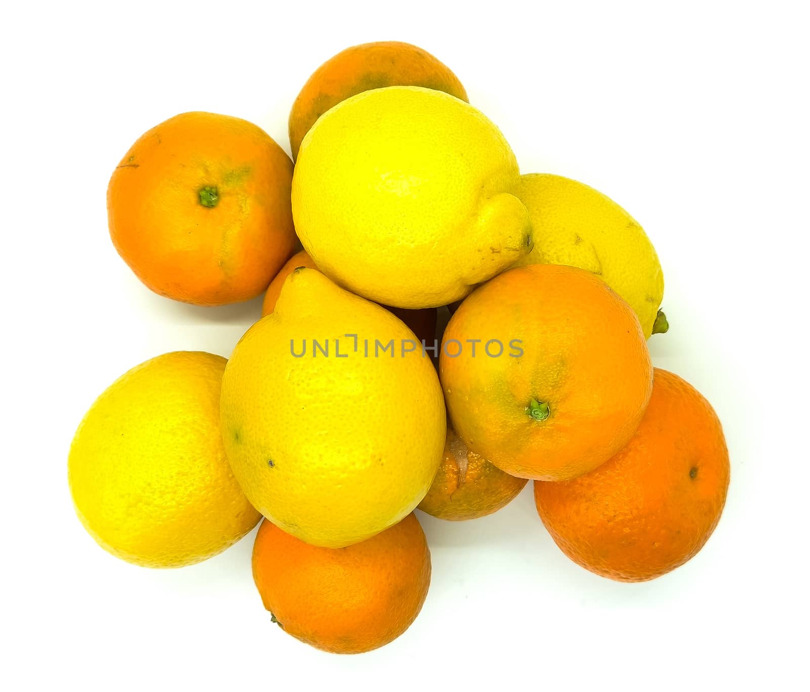 Orange and lemons in composition on white background