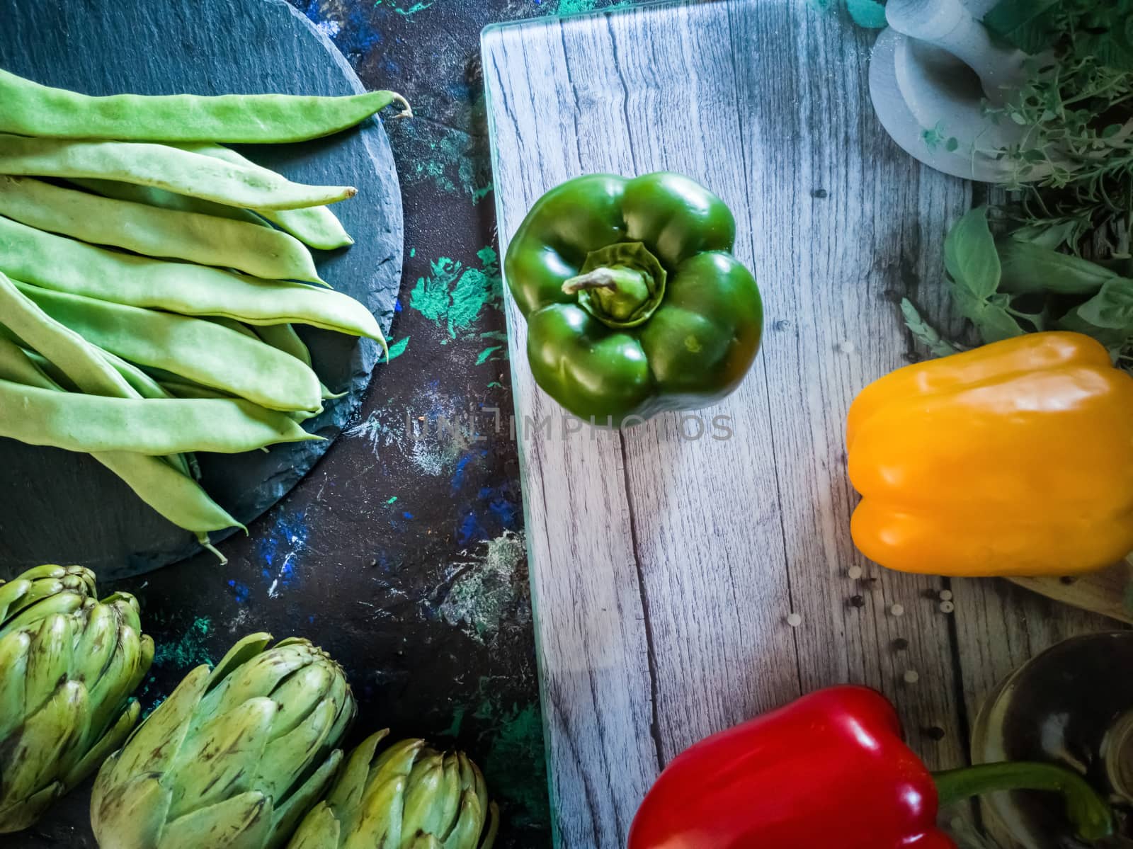 Orchard vegetables in composition on dark and rough background