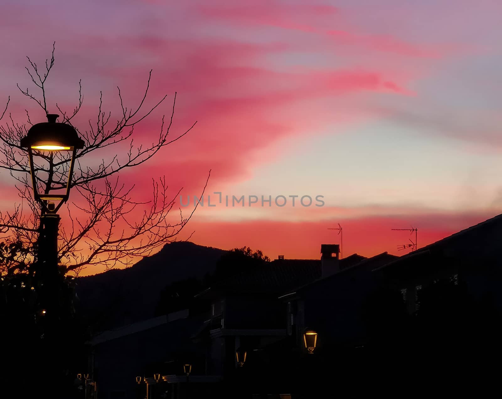 Sunset in pastel pink tones in the village of Algimia