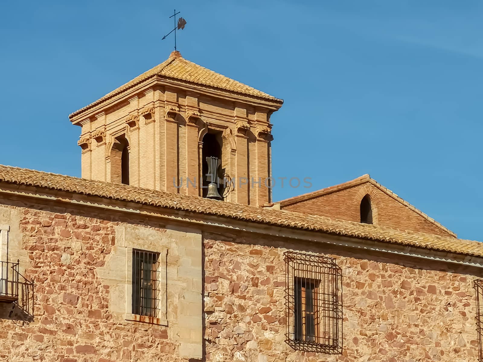 Bell tower of the monastery with blue sky