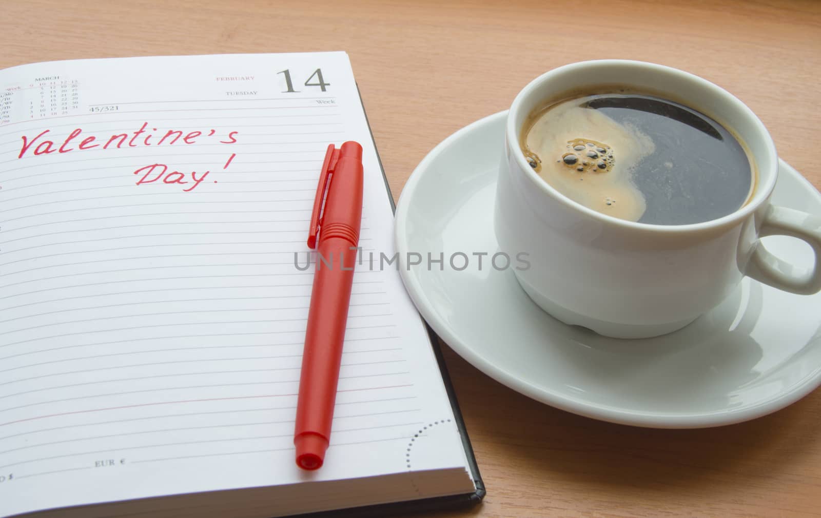 The concept of celebrating Valentine's Day, Cup coffee, diaries by claire_lucia