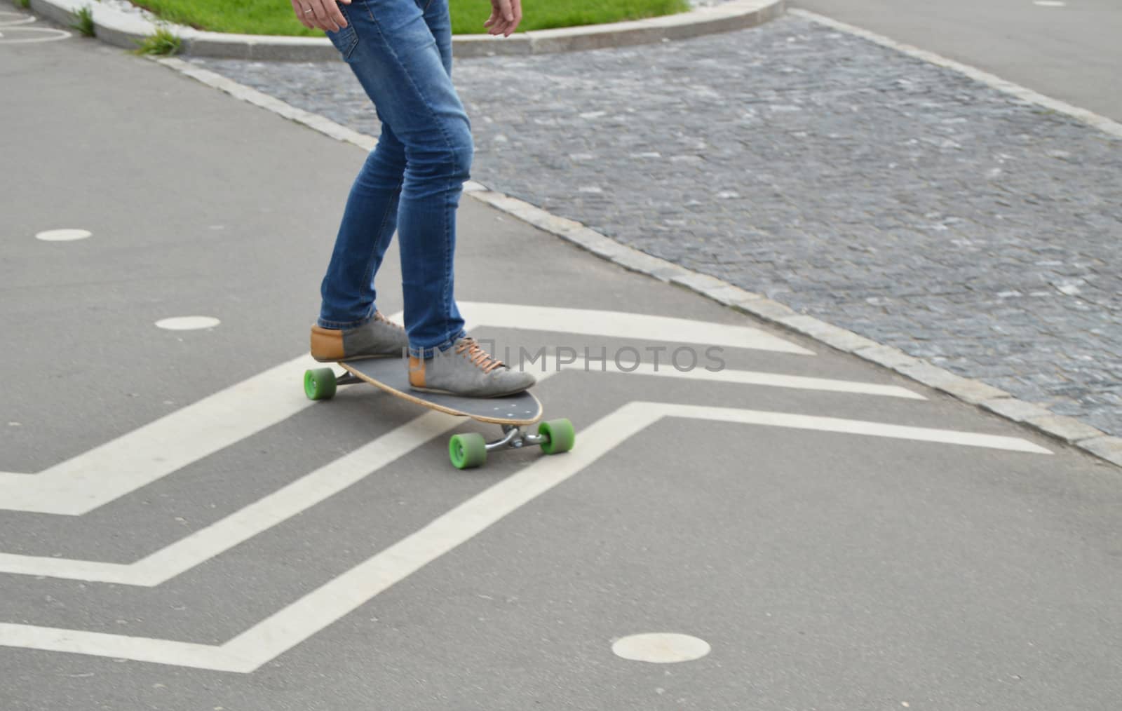 skateboarder is riding on the Board, sports and active lifestyle by claire_lucia