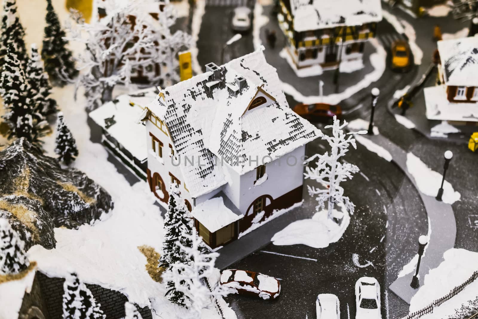 miniature city in winter - with houses, roads, cars, railway by alexandr_sorokin