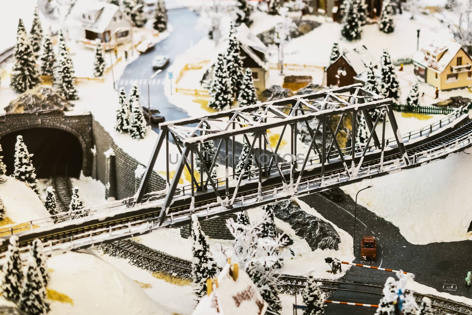 miniature city in winter - with houses, roads, cars, railway by alexandr_sorokin