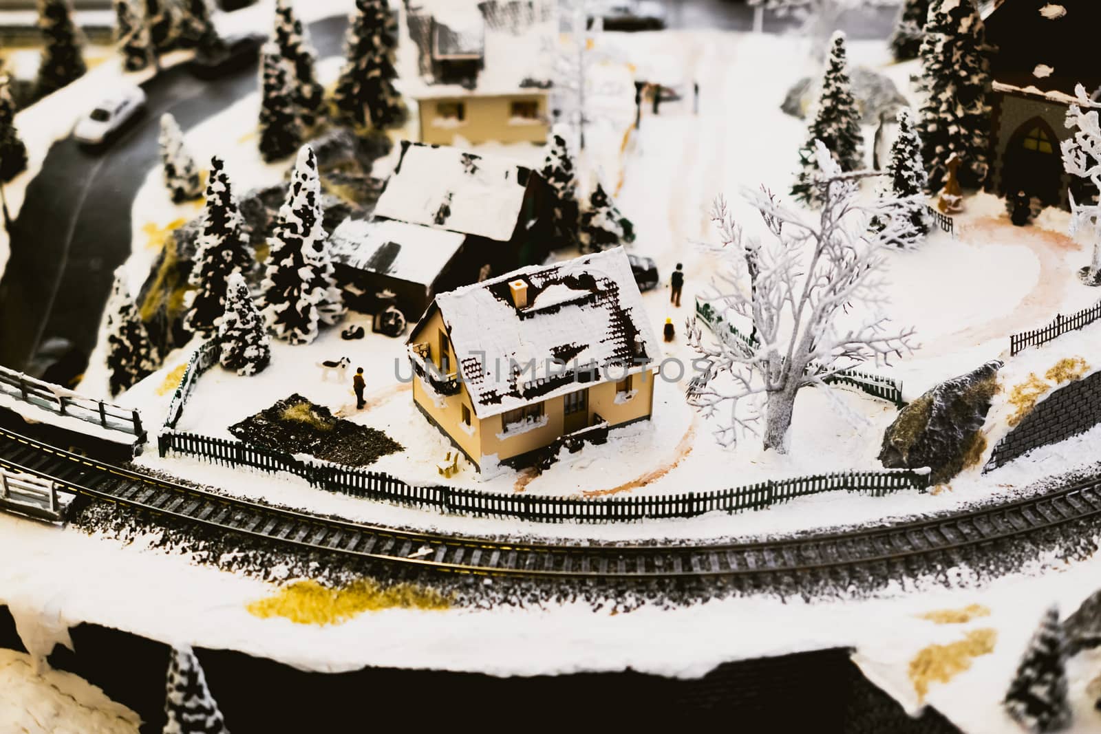 miniature city in winter - with houses, roads, cars, railway by alexandr_sorokin