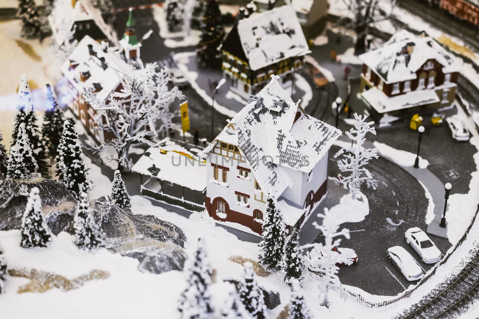 miniature city in winter - with houses, roads, cars, railway by alexandr_sorokin