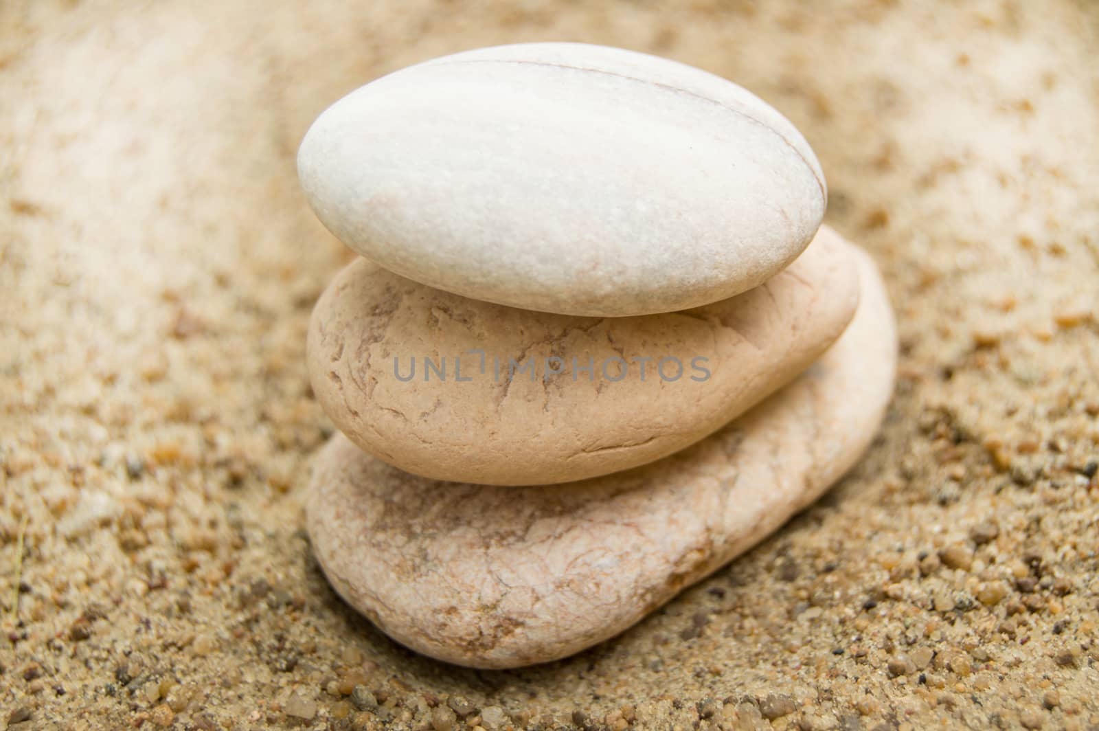 Zen stones on the beach for a perfect meditation, a blurred background by claire_lucia