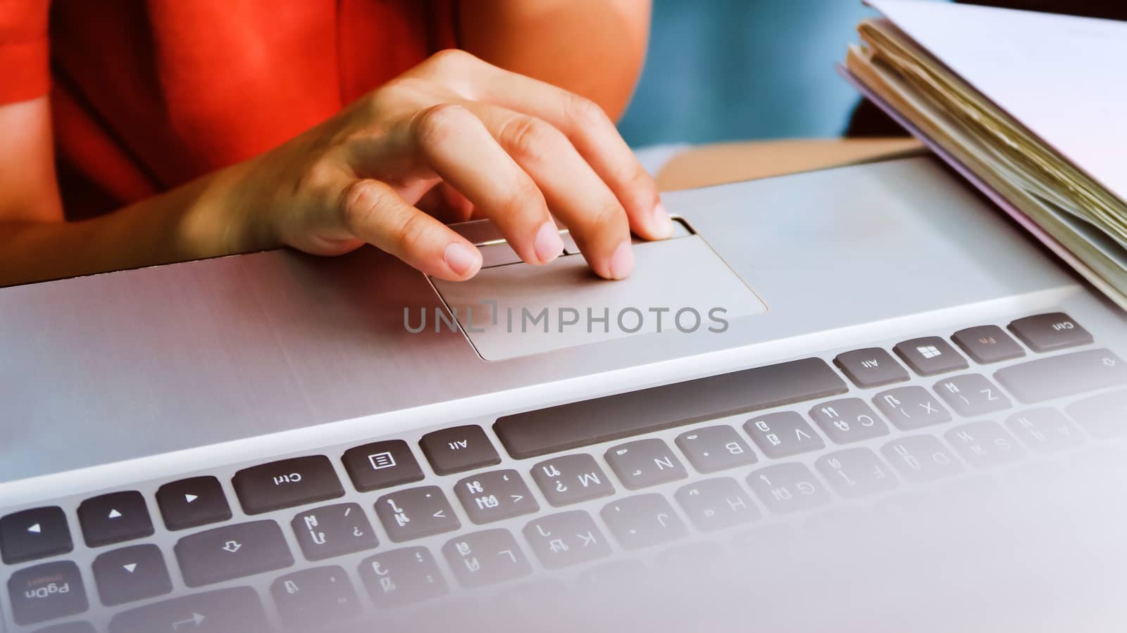 Woman using a labtop computer background