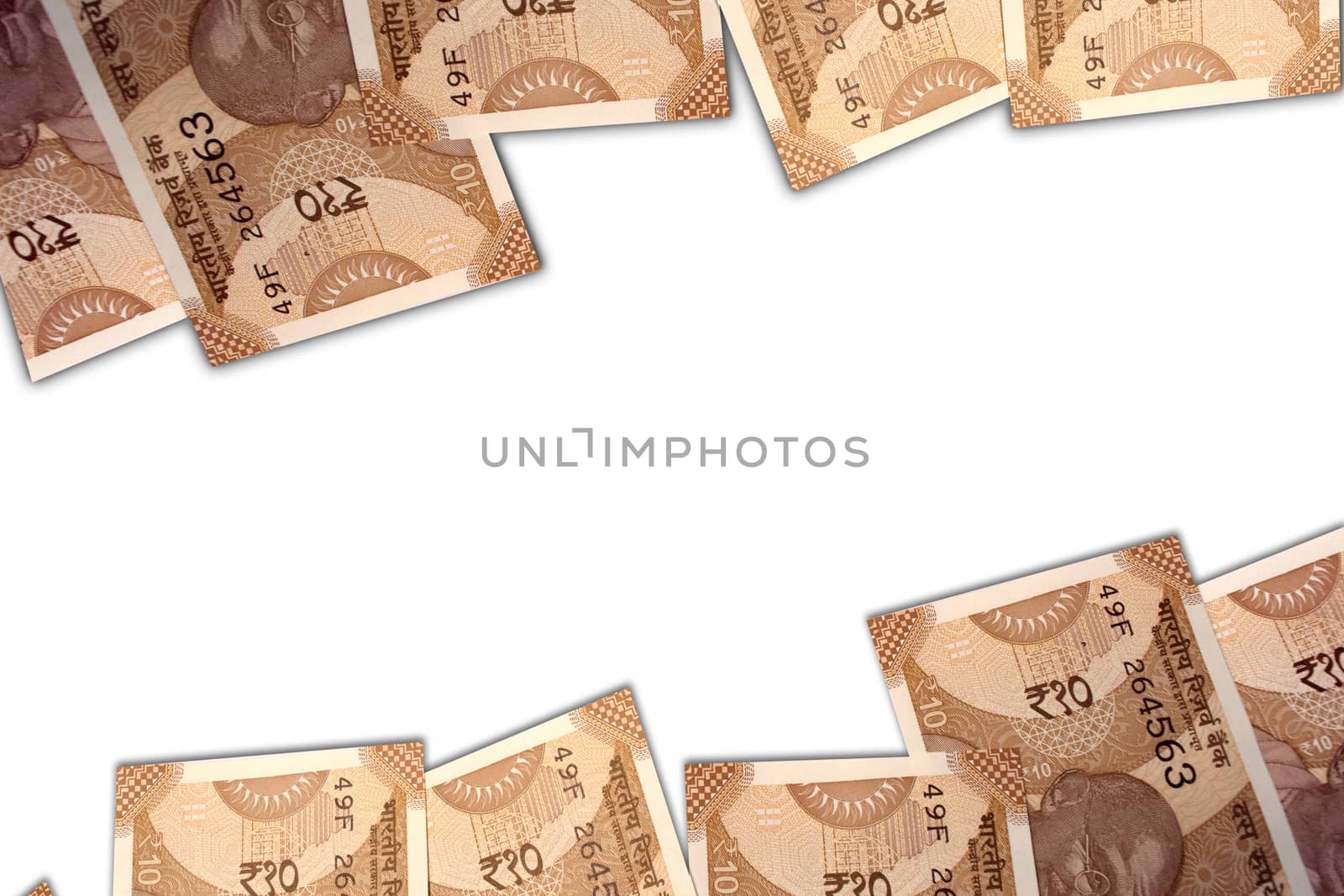 New Indian 10 rupee notes on white isolated background. by lakshmiprasad.maski@gmai.com