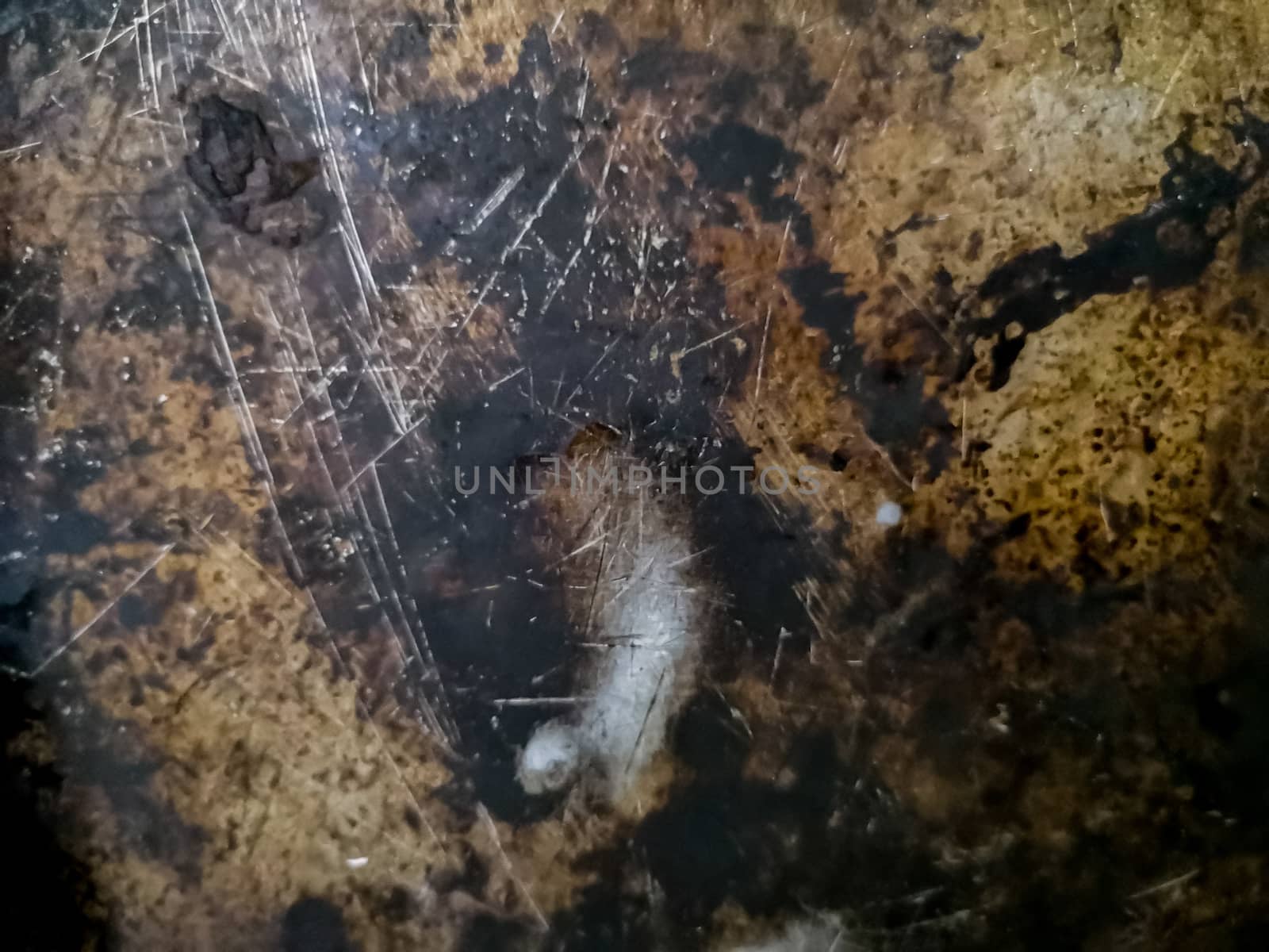 Rusty metal background with rough texture in brown tones
