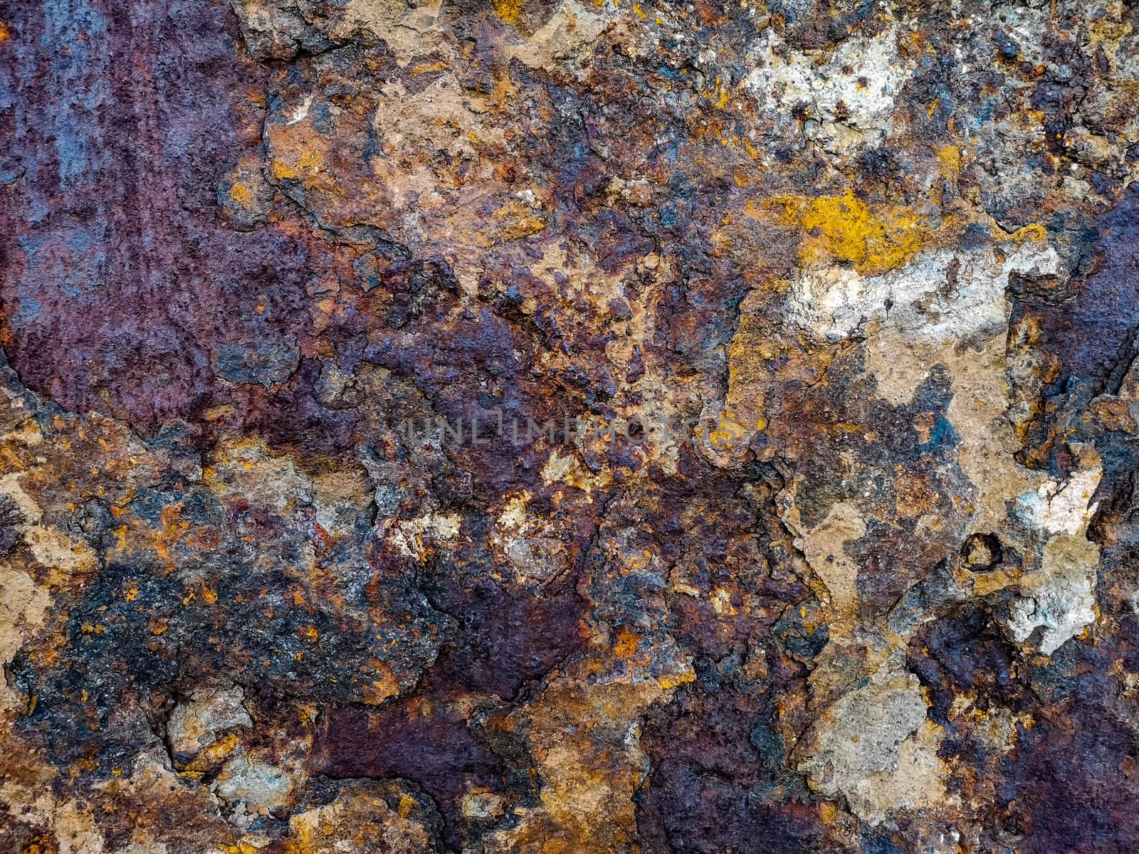 Rusty metal background with rough texture in brown tones