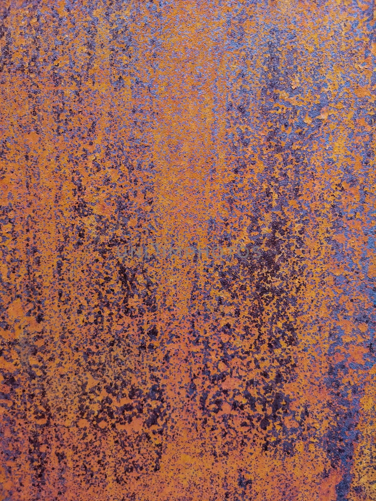 Rusty metal background with rough texture in brown tones