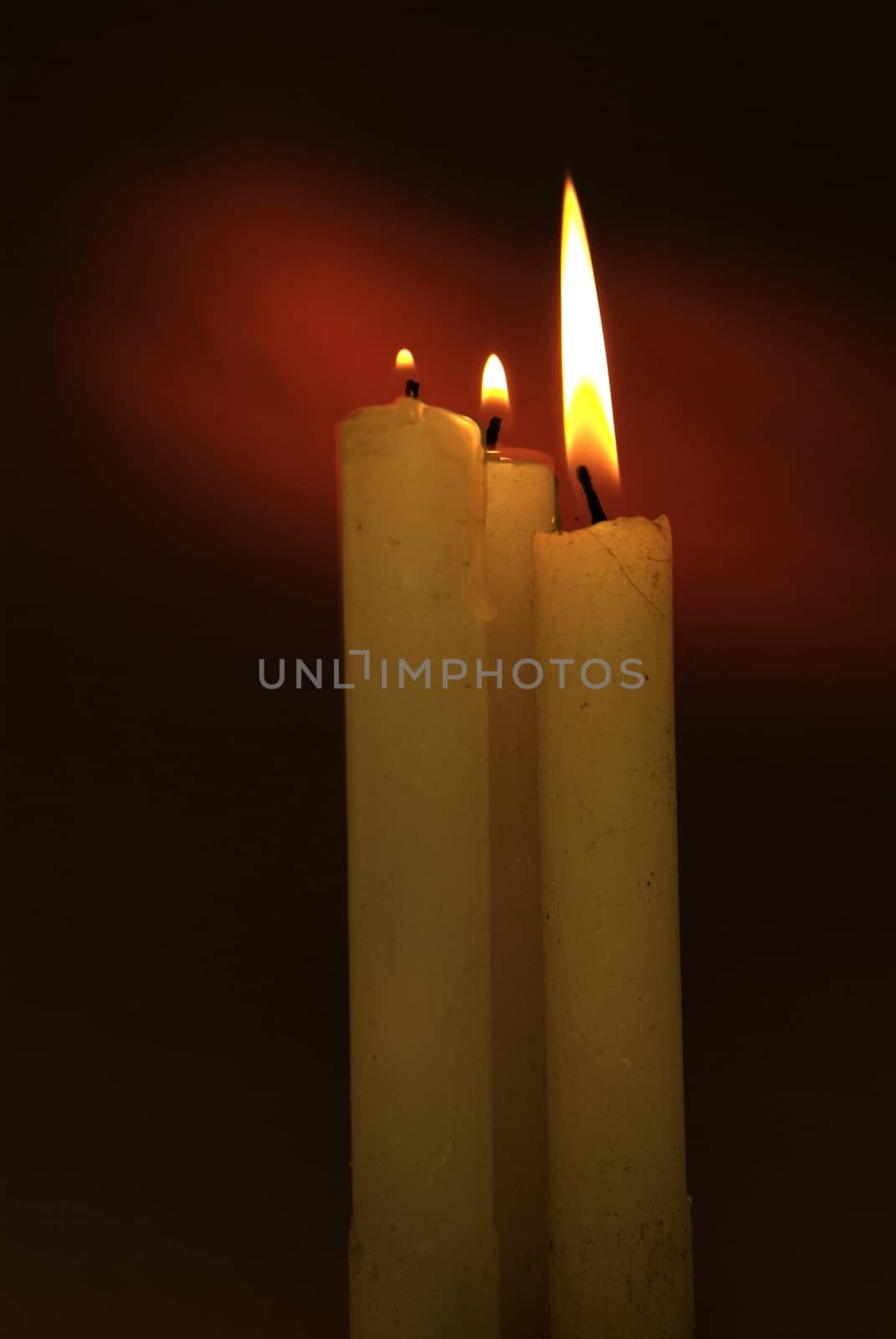 Candles flame close up on a black background